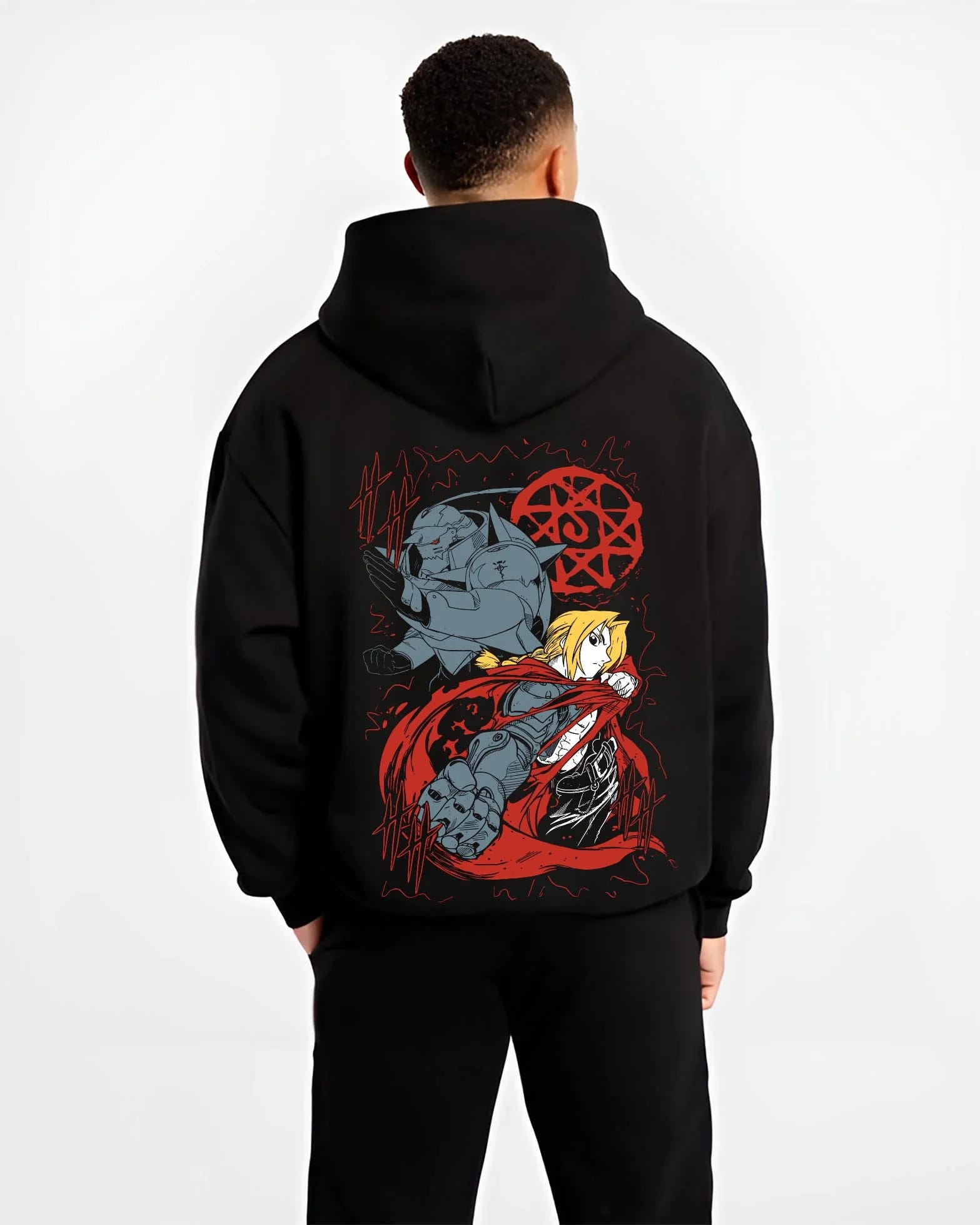 Black hoodie worn by male model, back view with Edward Elric Hoodie Fullmetal Alchemist Red Energy graphic bold anime graphic.