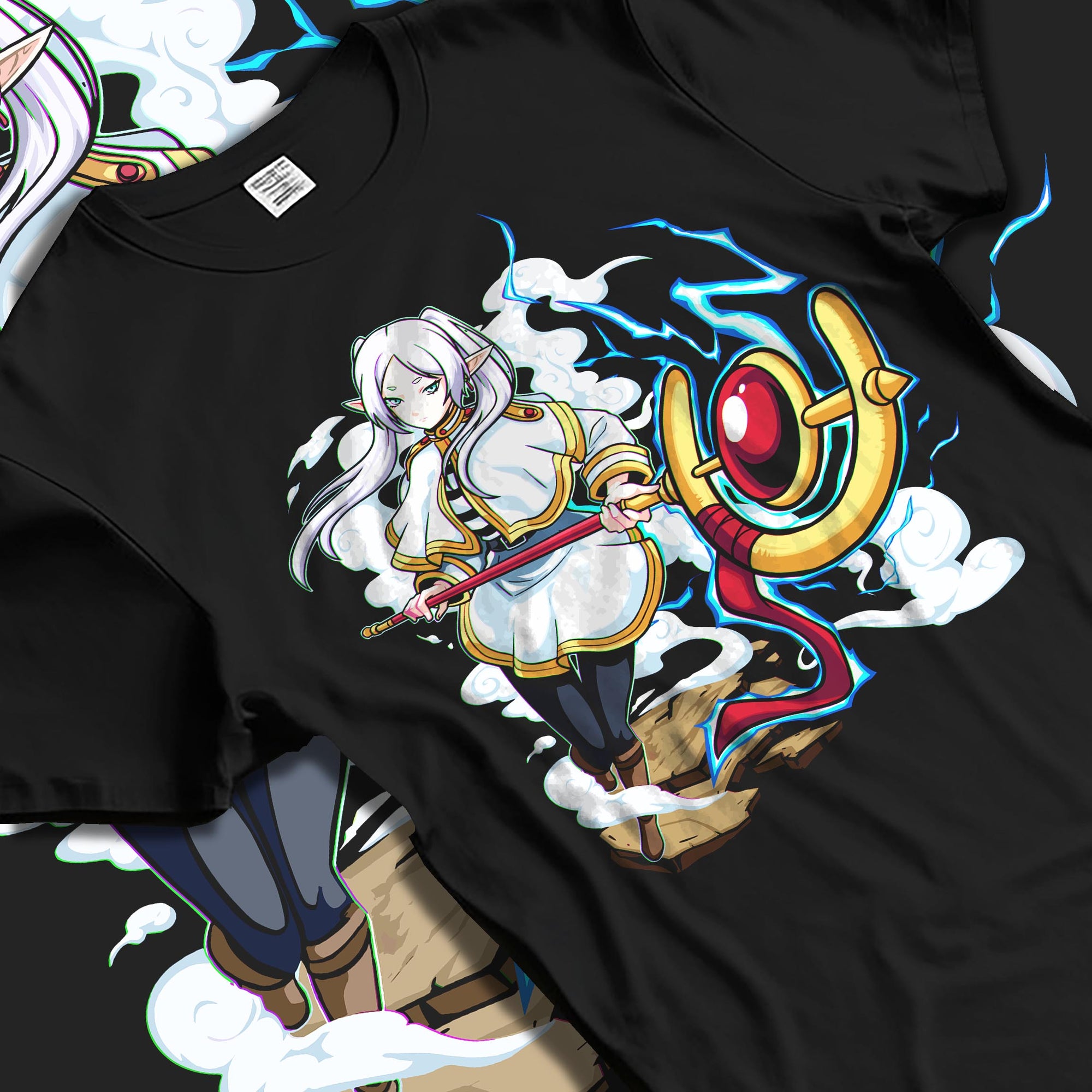 Black T-shirt laid flat with natural fabric folds, featuring Black Clover Mereoleona anime poster artwork with RPG fantasy glowing lightning sword detail.