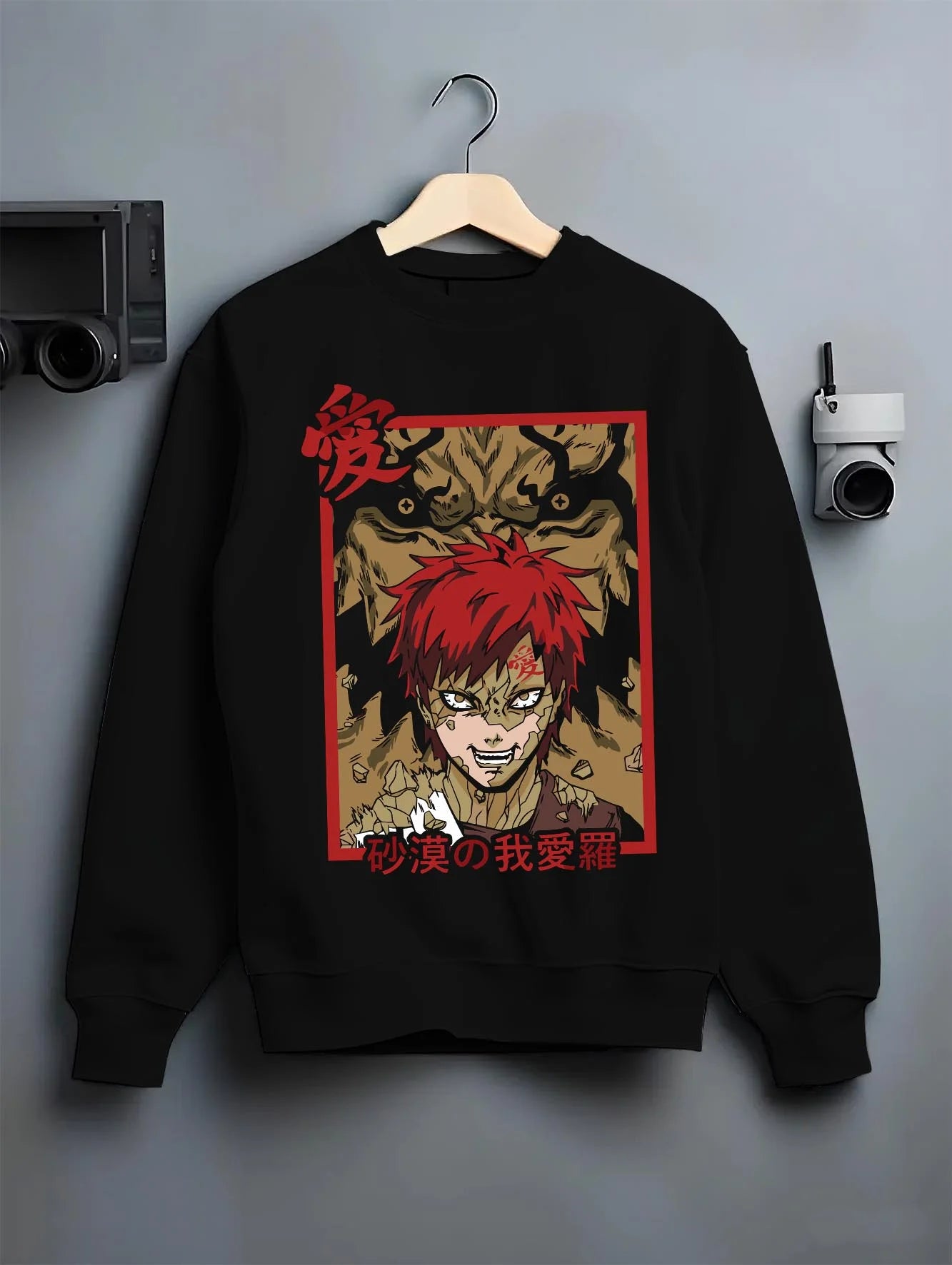 Black crewneck sweatshirt on hanger with Naruto Hoodie Gaara Sand Beast Transformation Jumper graphic bold anime graphic.