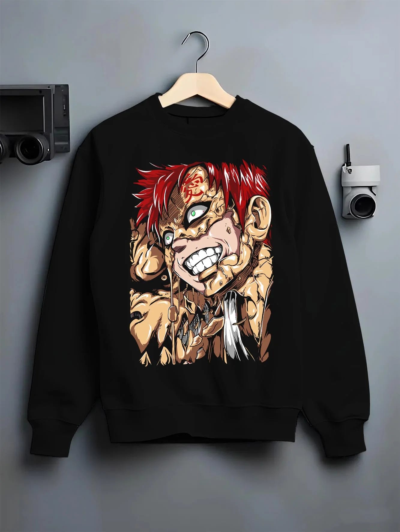 Black crewneck sweatshirt on hanger with Naruto Hoodie Gaara Sand Fury Rampage Jumper graphic Gaara anime design.