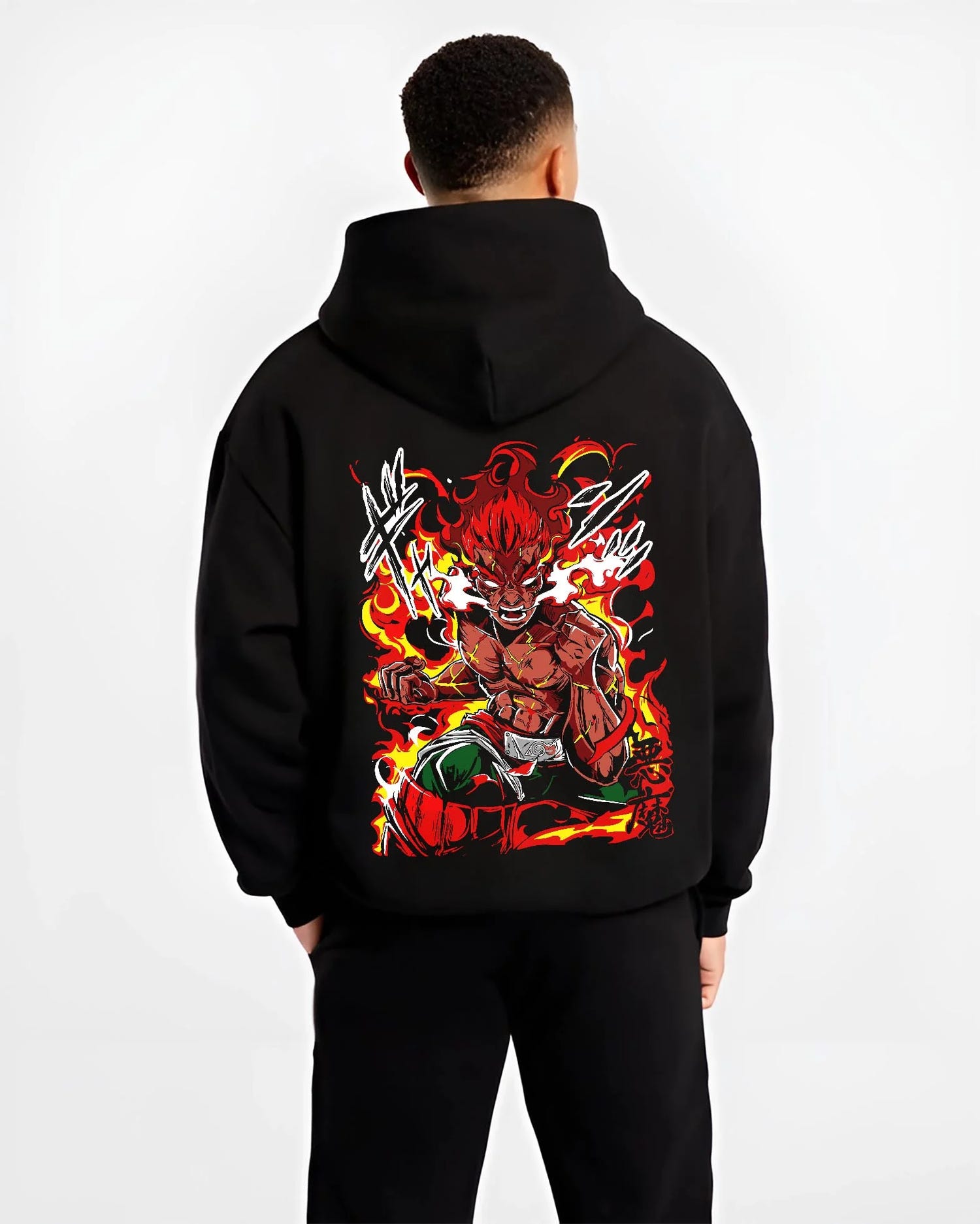 Black hoodie worn by male model, back view, showing shonen battle character artwork of Might Guy with fire energy.