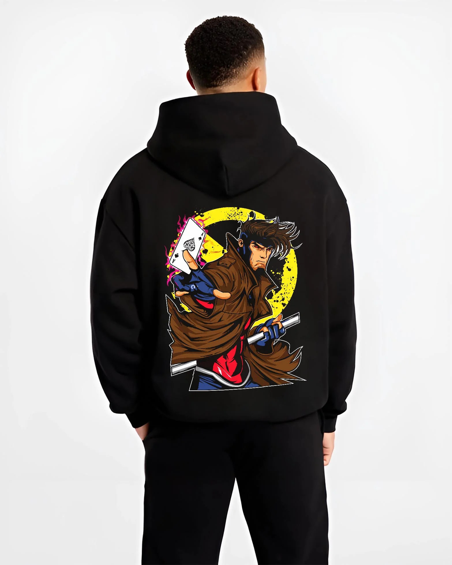Black hoodie worn by male model, back view with Yu Gi Oh Hoodie Gambit Yami Yugi Duelist Jumper graphic premium wear.
