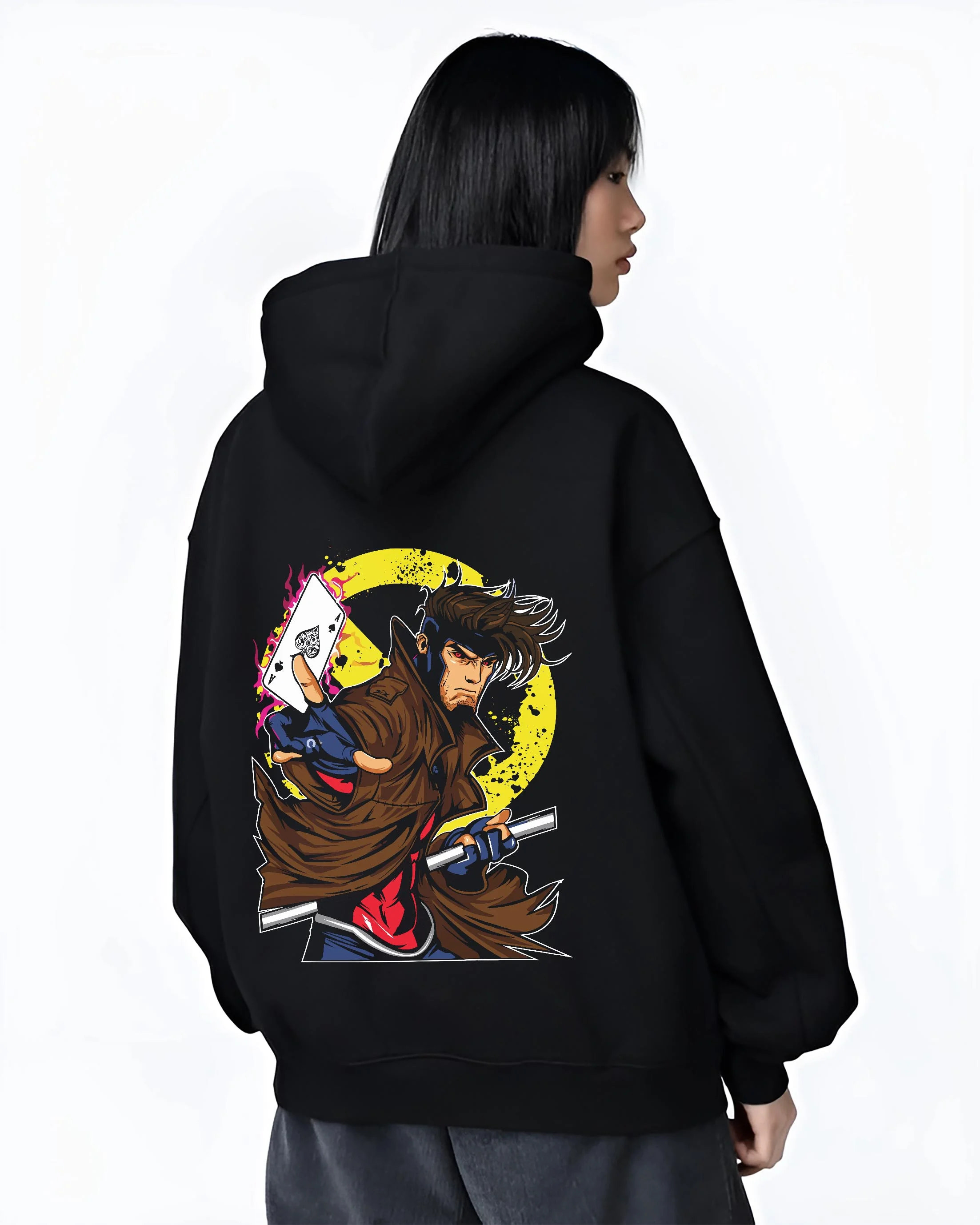 Black hoodie worn by female model, back view with Yu Gi Oh Hoodie Gambit Yami Yugi Duelist Jumper graphic streetwear graphic.