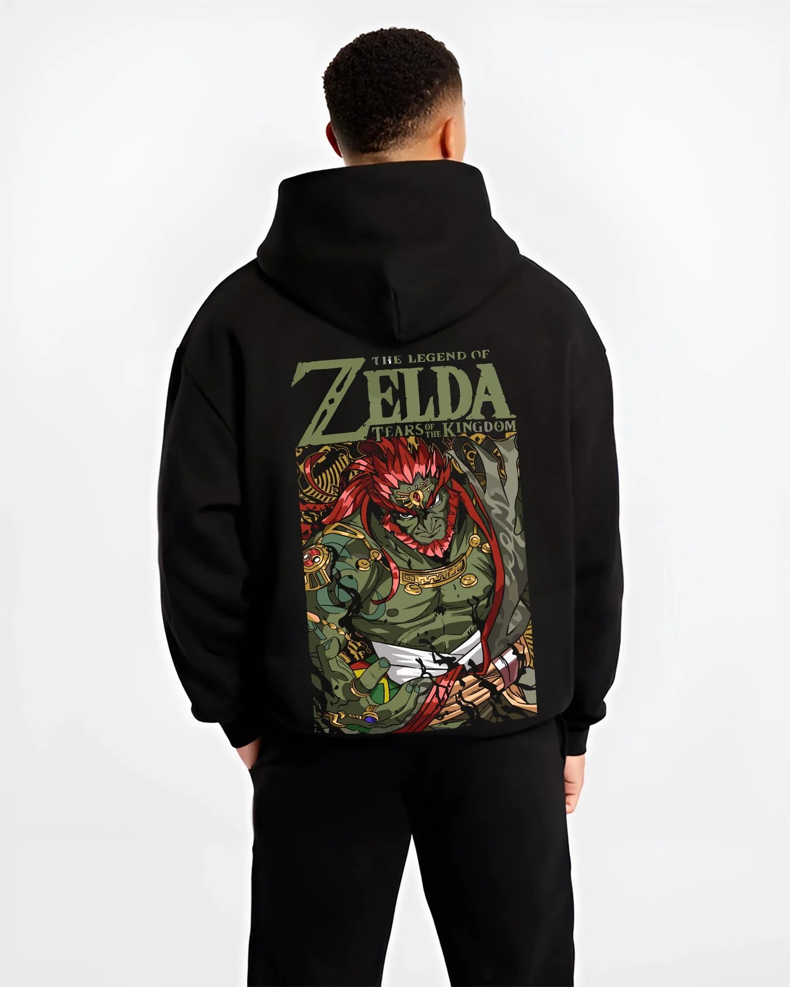 Black hoodie worn by male model, back view with Legend of Zelda Hoodie Ganondorf King Gerudo Jumper graphic bold anime graphic.