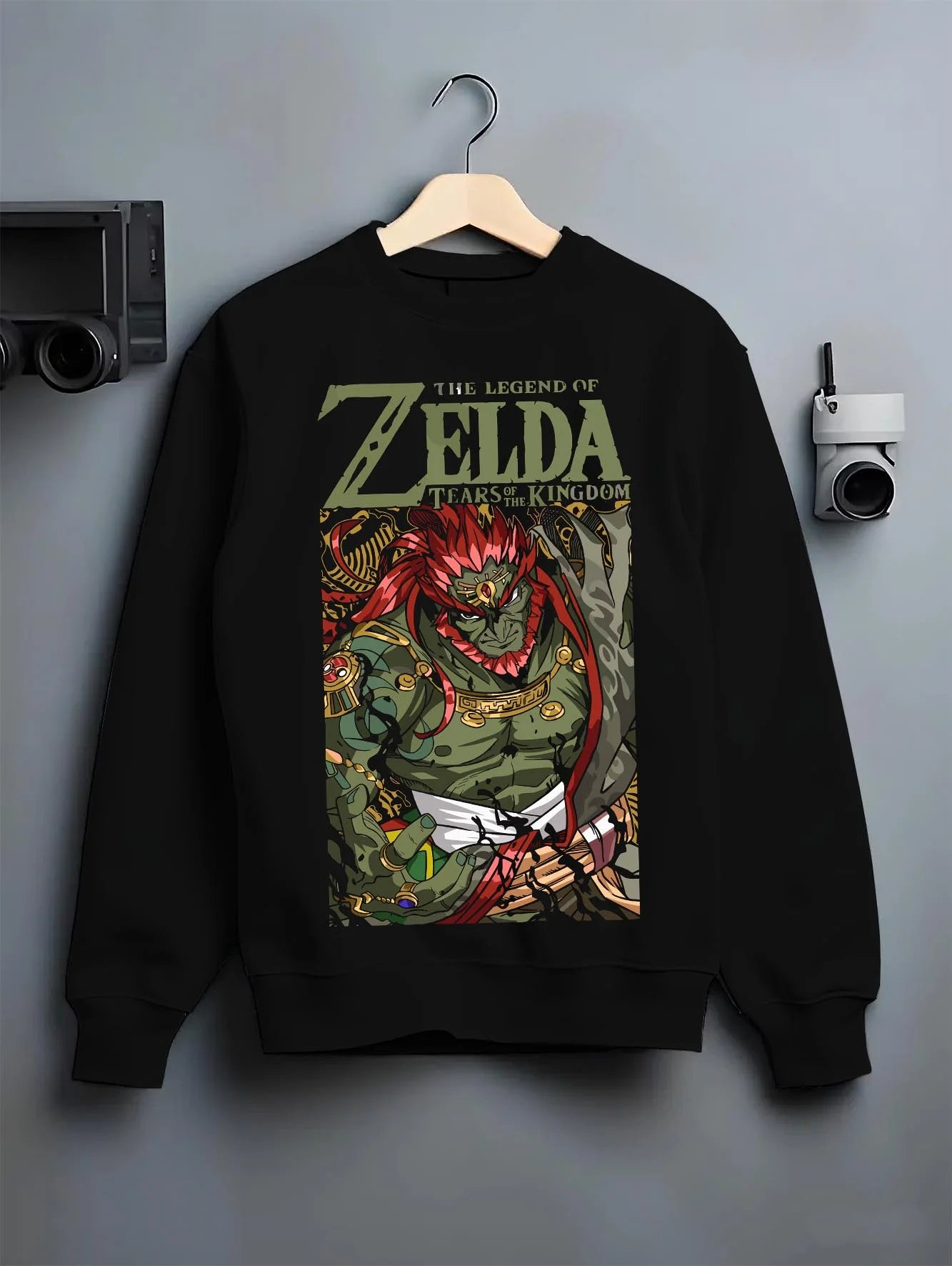 Black crewneck sweatshirt on hanger with Legend of Zelda Hoodie Ganondorf King Gerudo Jumper graphic bold anime graphic.