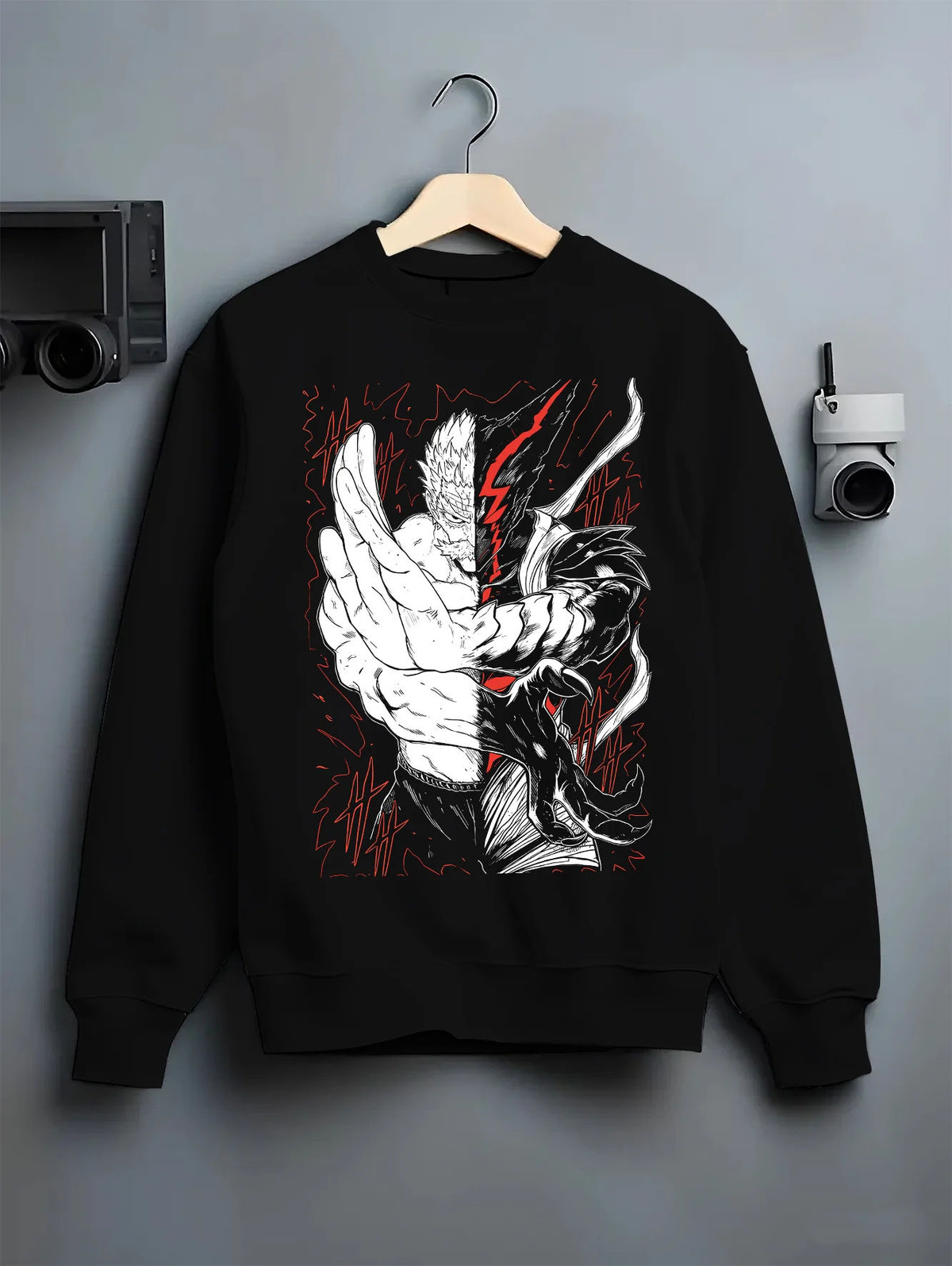 Black crewneck sweatshirt on hanger showing Garou and Bang from One Punch Man: Silver Fang