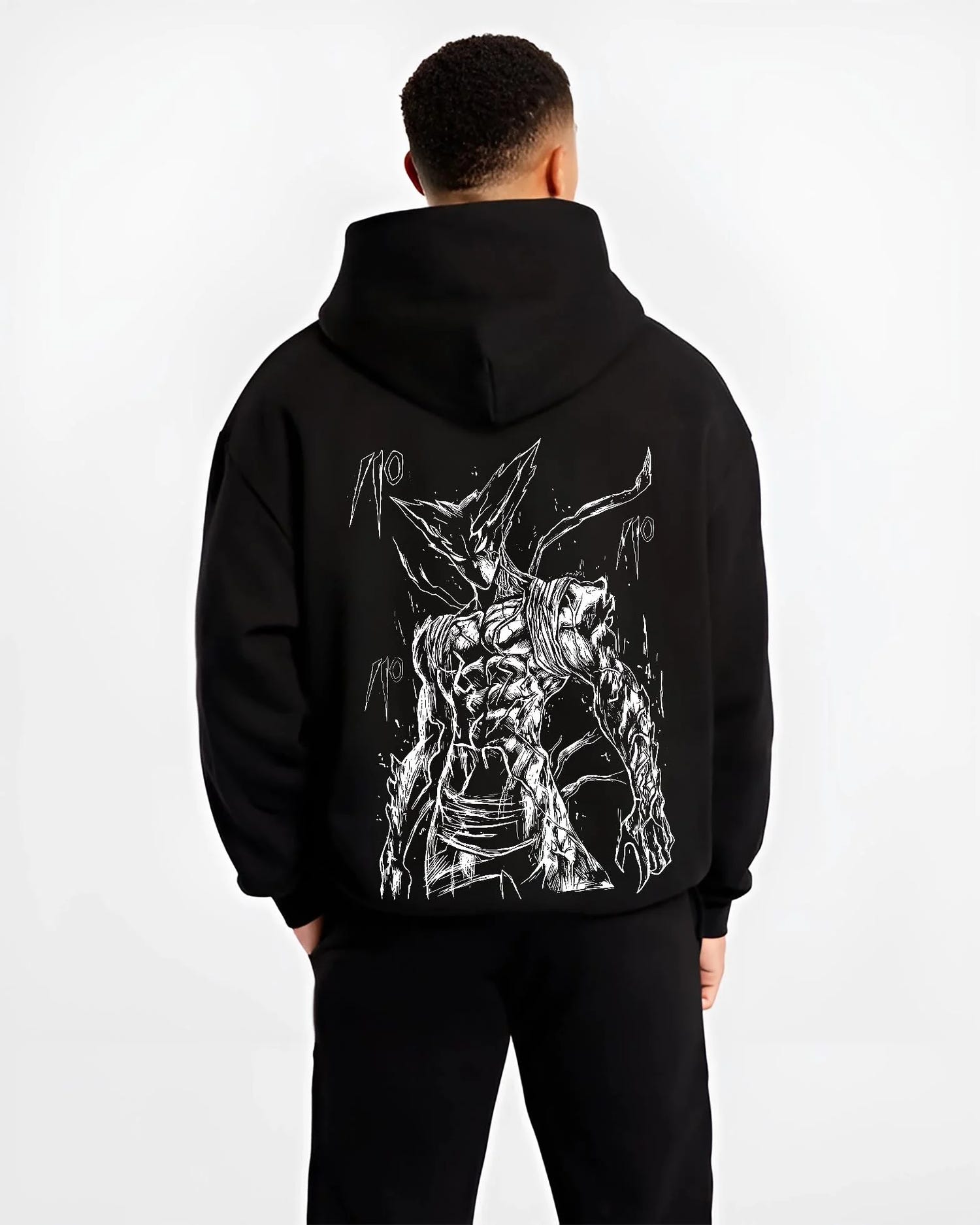 Black hoodie worn by male model, back view with Bleach Hoodie Hollow Ichigo Silver Form Jumper graphic streetwear graphic.