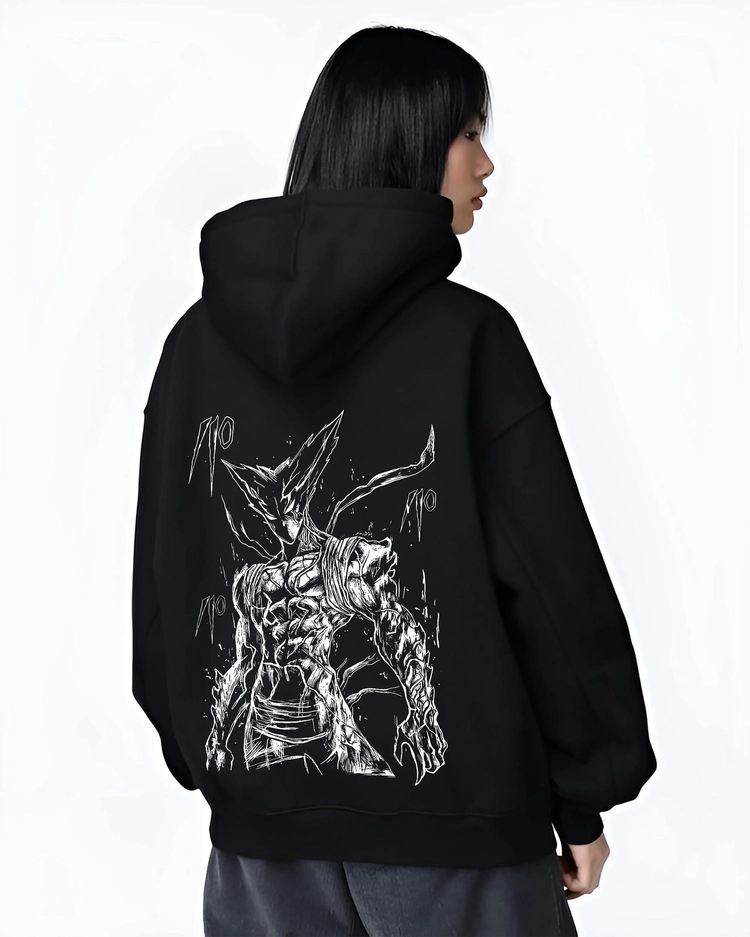 Black hoodie worn by female model, back view with Bleach Hoodie Hollow Ichigo Silver Form Jumper graphic bold anime graphic.