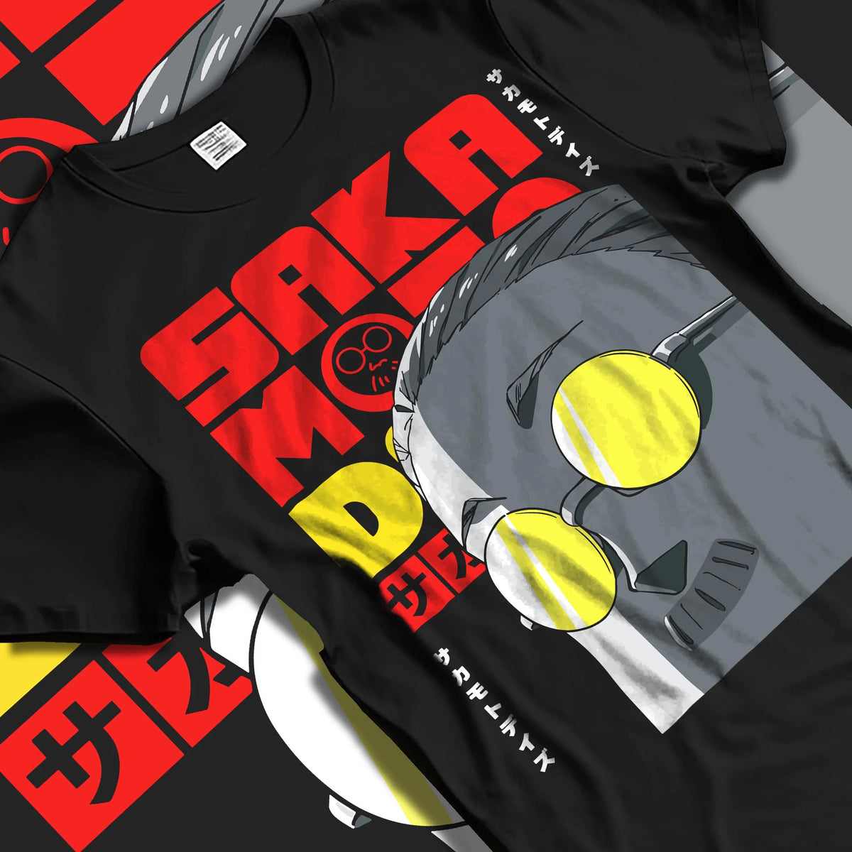 Black T-shirt laid flat with natural folds featuring Sakamoto Days gas mask assassin artwork.