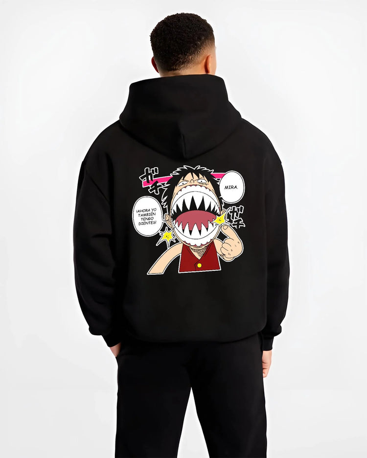 Black hoodie worn by male model, back view with One Piece Hoodie Luffy Funny Shark Mouth Jumper graphic premium wear.