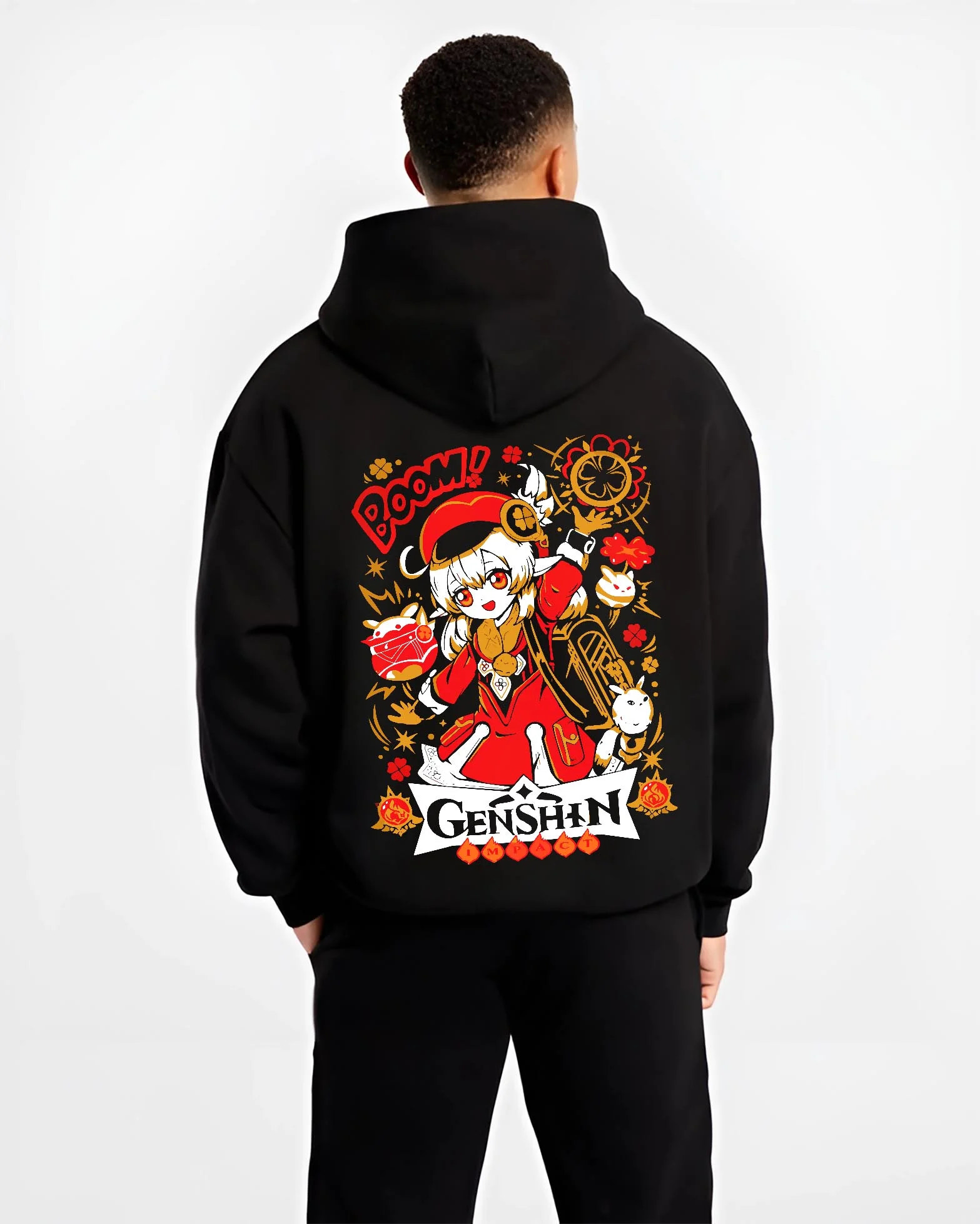Black hoodie worn by male model, back view with Genshin Impact Hoodie Klee Bombastic Attack Jumper graphic streetwear graphic.