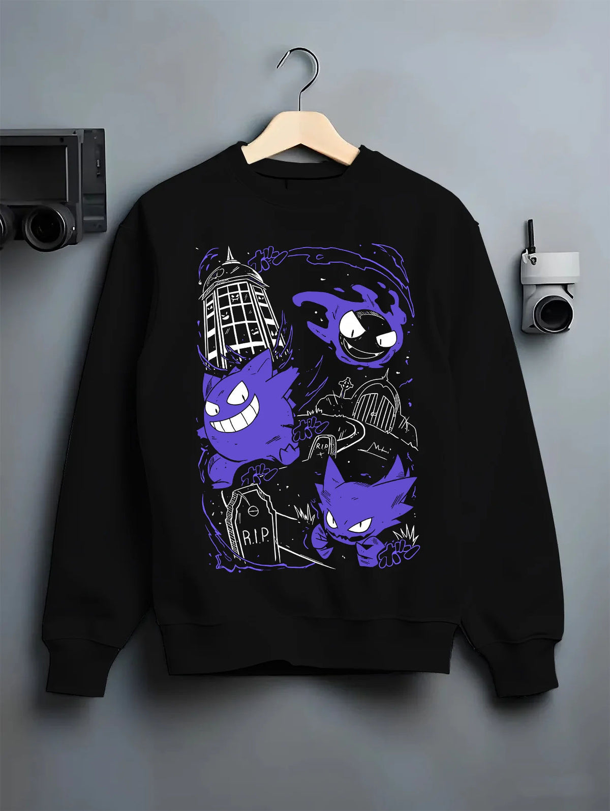 Black crewneck sweatshirt on hanger with Gengar evolution line / retro Game Boy illustration from Pokémon illustrated back