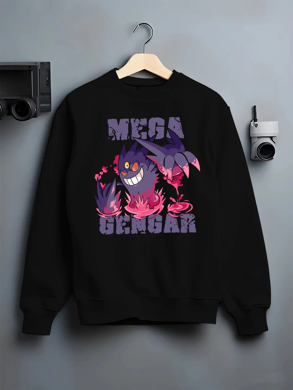 Black crewneck sweatshirt on hanger with Mega Gengar / pink flames from Pokémon illustrated back graphic