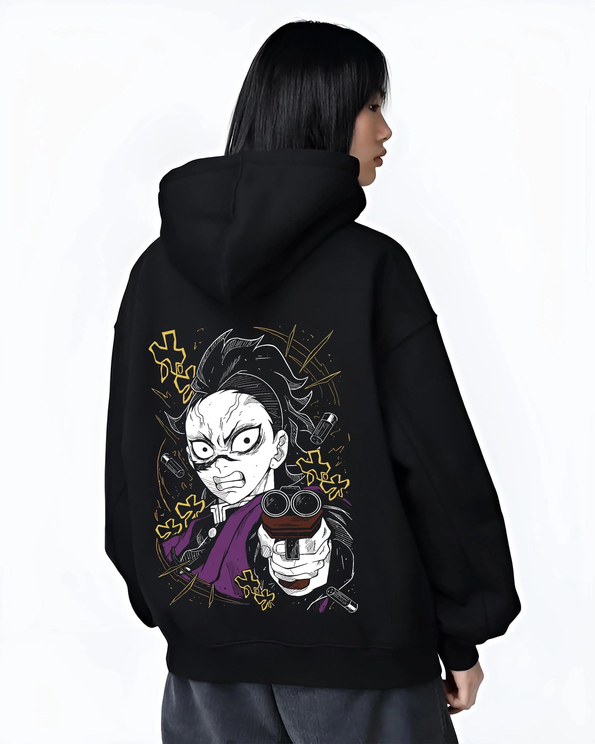 Black hoodie worn by female model, back view with Demon Slayer Hoodie Yoriichi Tsugikuni Blade Jumper graphic bold anime graphic.