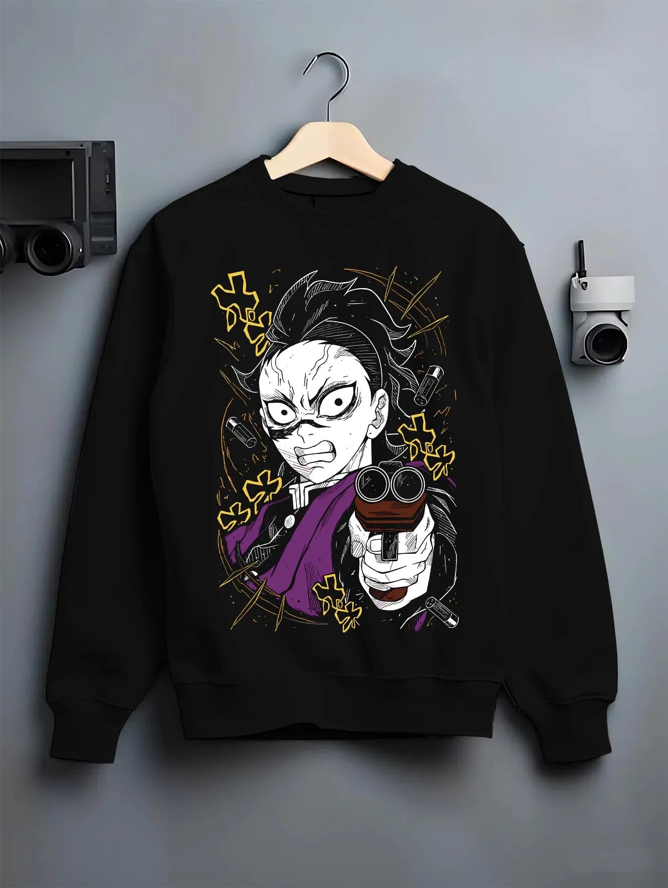 Black crewneck sweatshirt on hanger with Demon Slayer Hoodie Yoriichi Tsugikuni Blade Jumper graphic bold anime graphic.