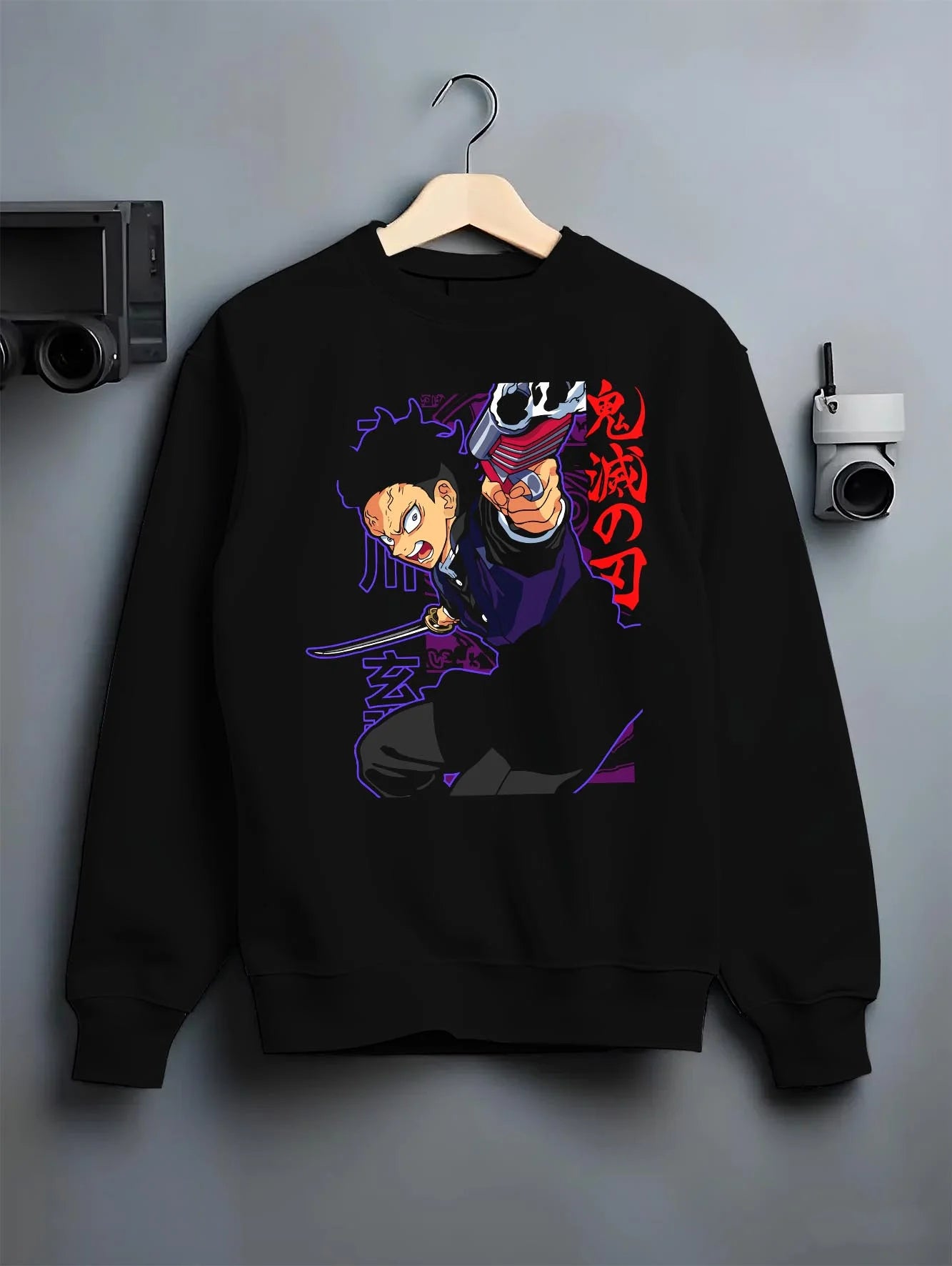 Black crewneck sweatshirt on hanger with Demon Slayer Hoodie Gyomei Himejima Stone Jumper graphic streetwear graphic.