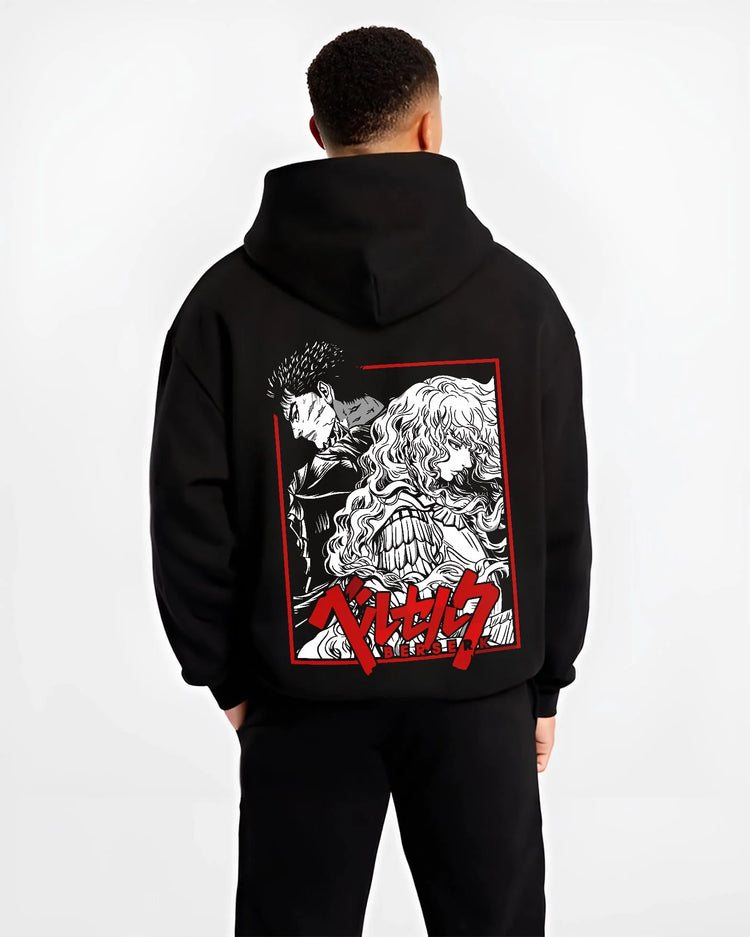 Black hoodie worn by male model, back view with Guts Hoodie Berserk Dragonslayer Sword Battle Rage graphic Guts anime design.