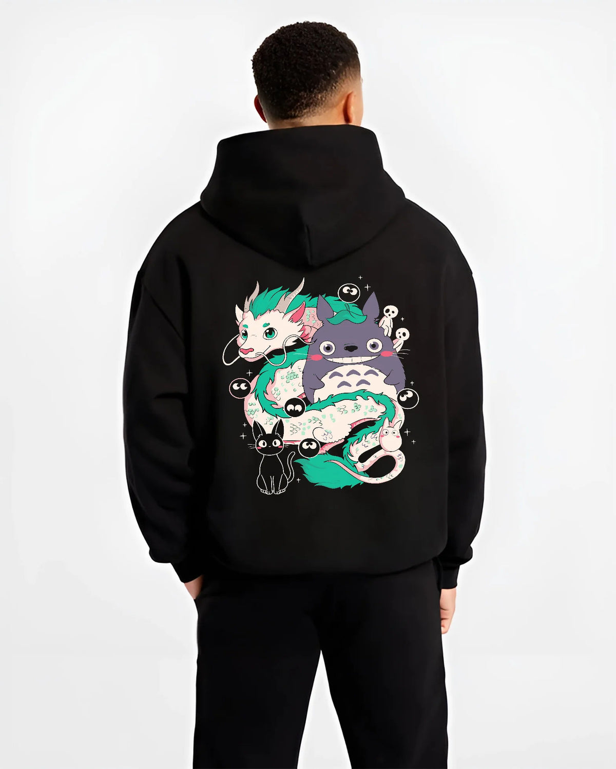 Black hoodie model back view showing Studio Ghibli crossover: Haku, Totoro and spirits