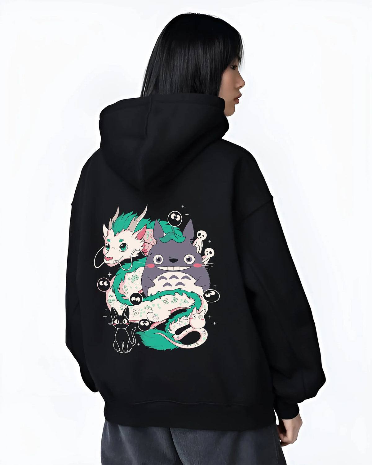 Black hoodie female model back view showing Studio Ghibli crossover: Haku, Totoro and spirits