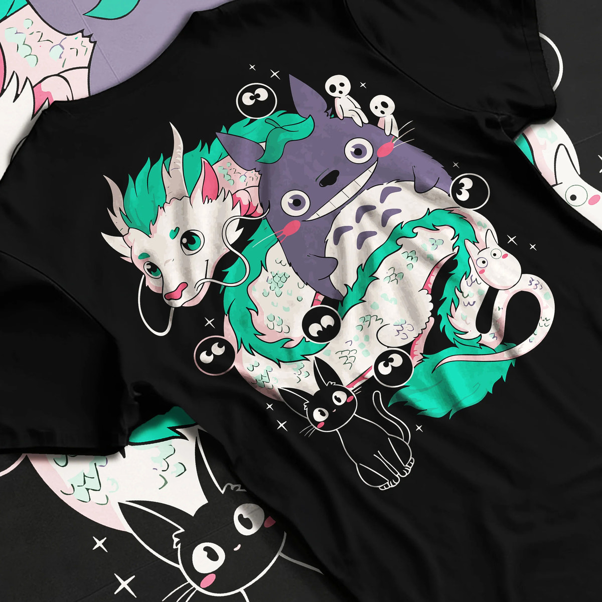 Black T-shirt flat back view showing Studio Ghibli crossover: Haku, Totoro and spirits