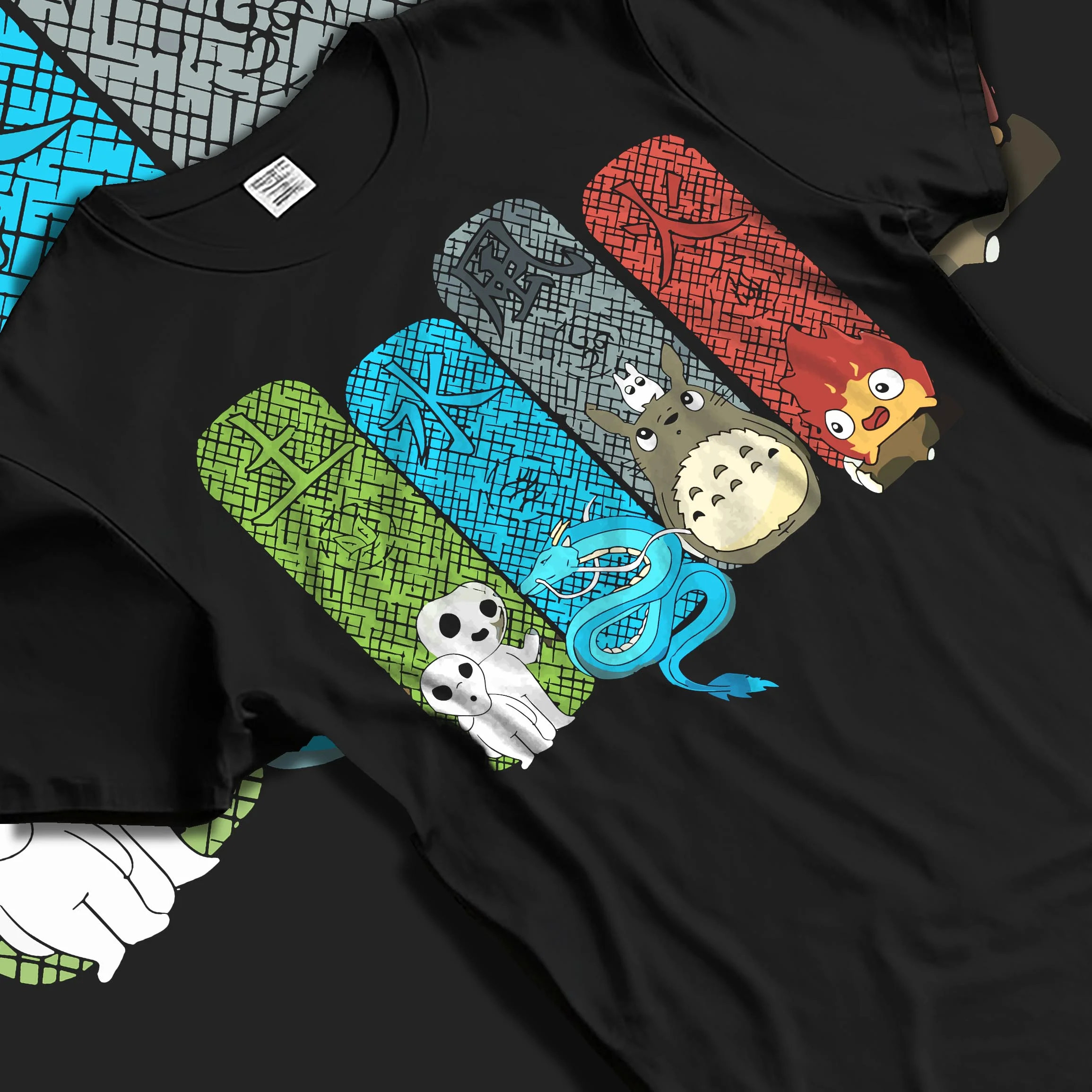 Black T-shirt laid flat with natural folds with Studio Ghibli Hoodie Totoro Spirited Forest Jumper graphic bold anime graphic.
