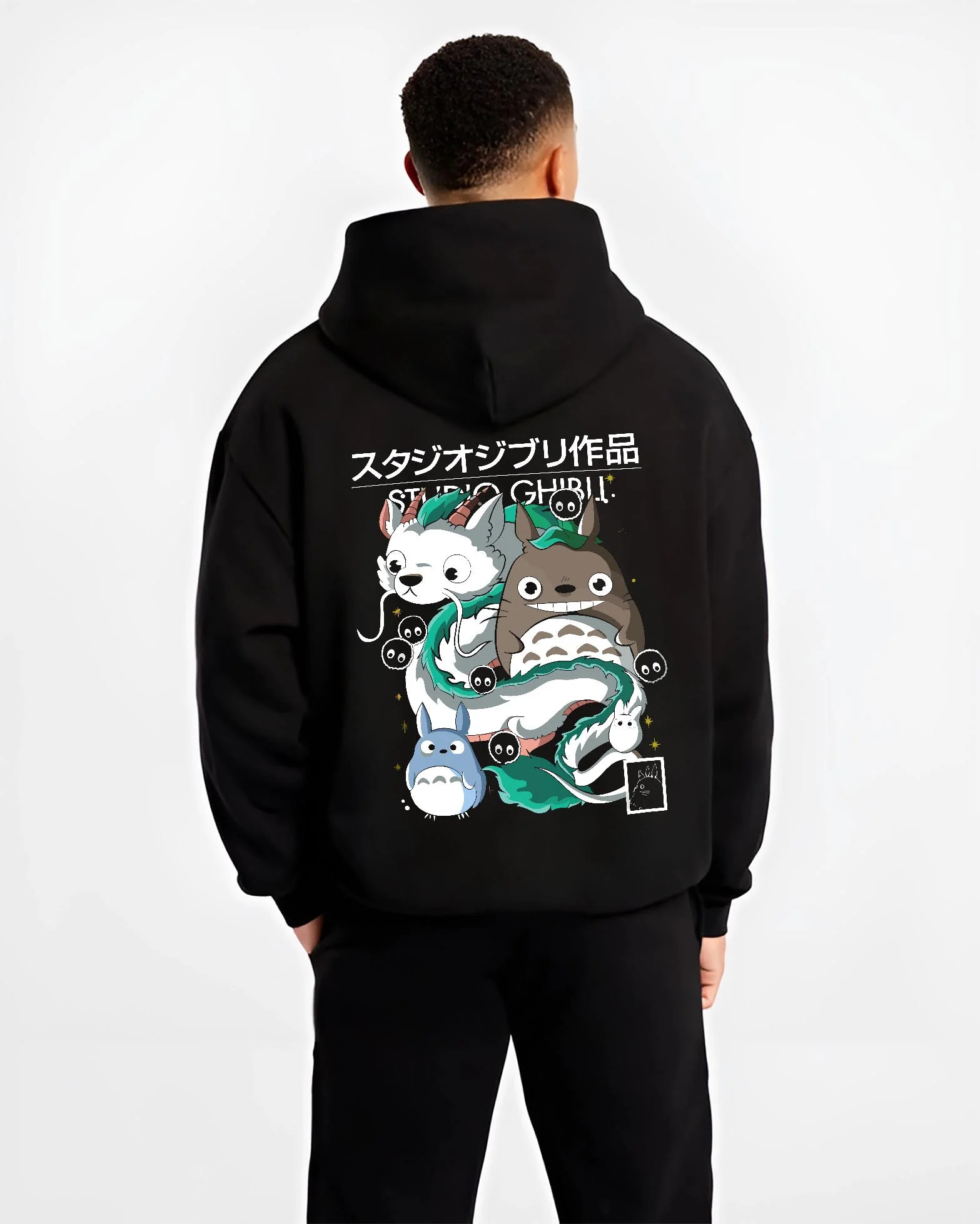 Black hoodie worn by male model, back view with Studio Ghibli Hoodie Totoro Blue White Jumper graphic Totoro anime design.