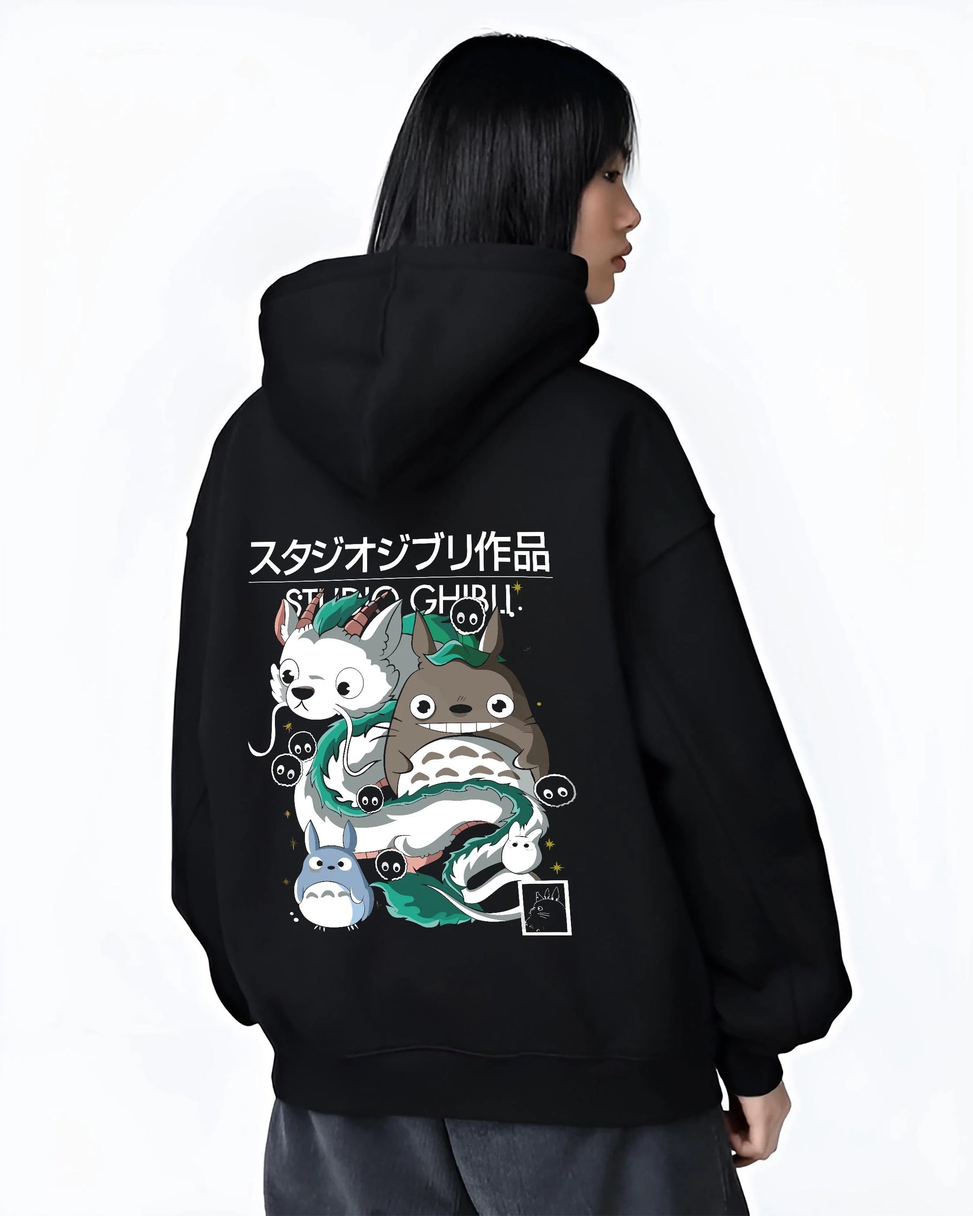 Black hoodie worn by female model, back view with Studio Ghibli Hoodie Totoro Blue White Jumper graphic premium wear.