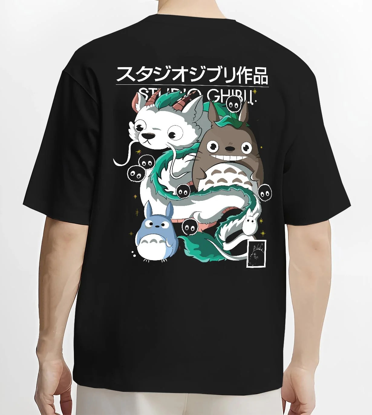 Black T-shirt worn by male model, back view with Studio Ghibli Hoodie Totoro Blue White Jumper graphic Totoro anime design.