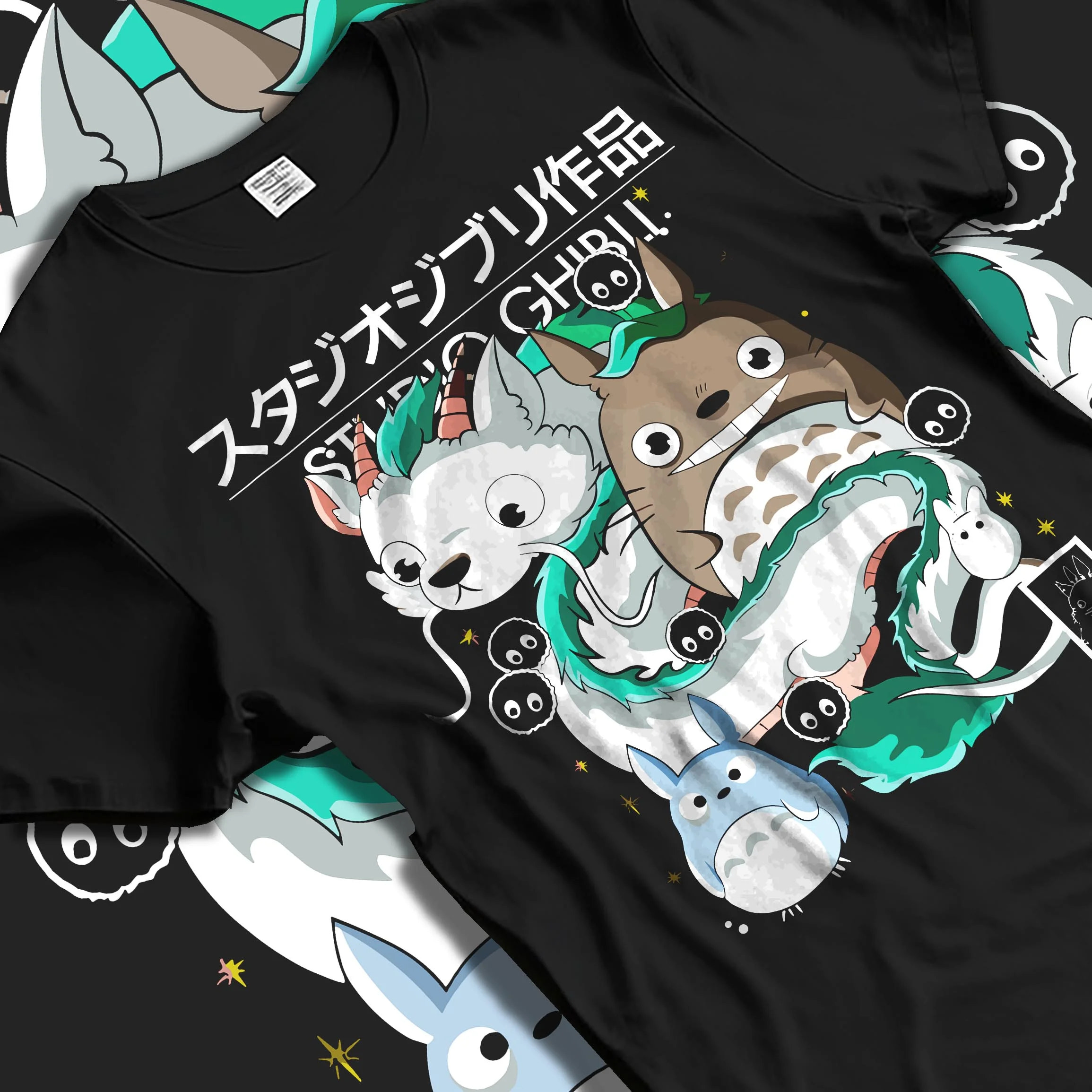 Black T-shirt laid flat with natural folds with Studio Ghibli Hoodie Totoro Blue White Jumper graphic bold anime graphic.