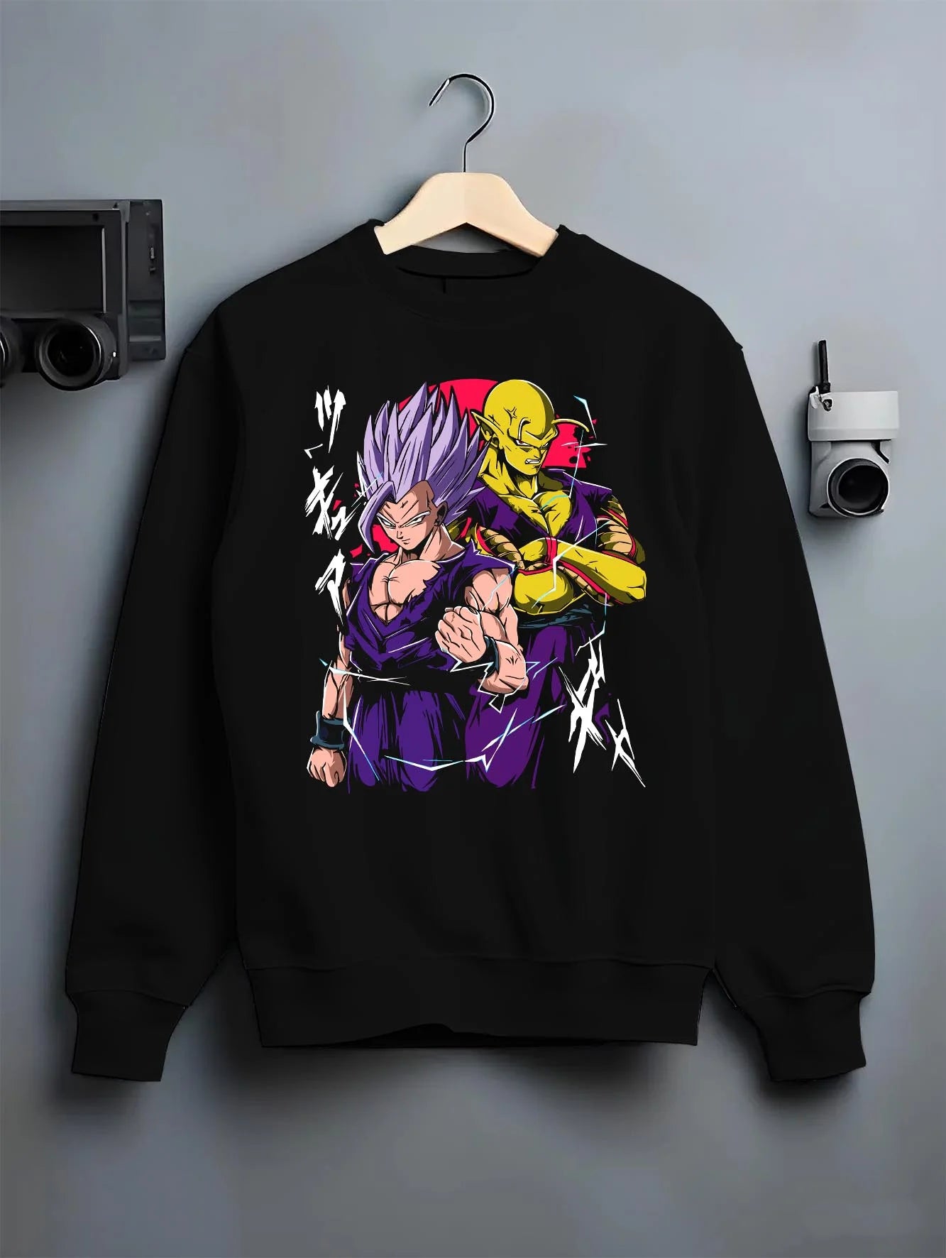 Black crewneck sweatshirt on hanger with Piccolo Hoodie Dragon Ball Z Purple Warrior Fusion graphic bold anime graphic.