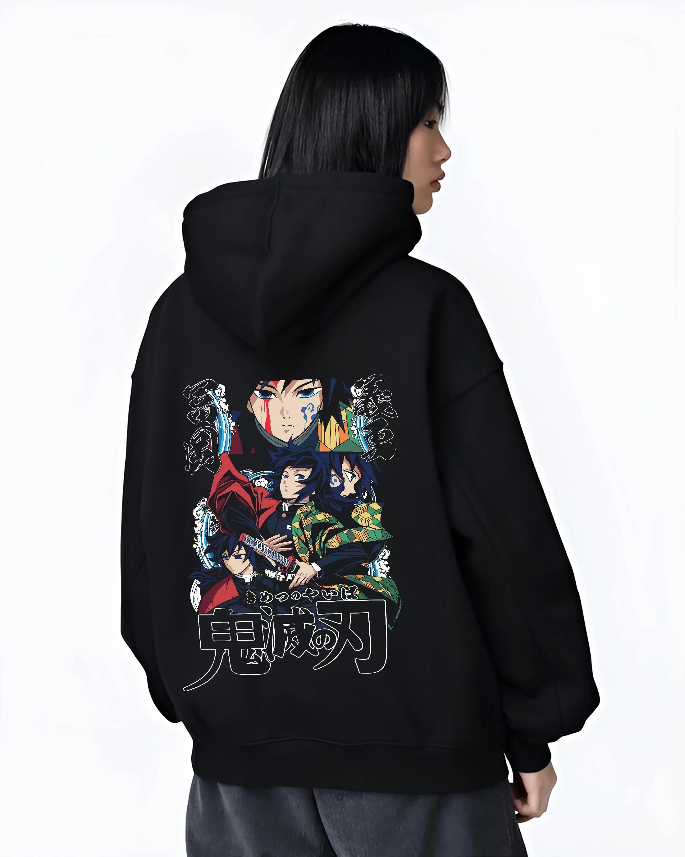 Black hoodie worn by female model, back view with Demon Slayer Hoodie Giyu Tomioka Water Pillar Jumper graphic bold anime graphic.