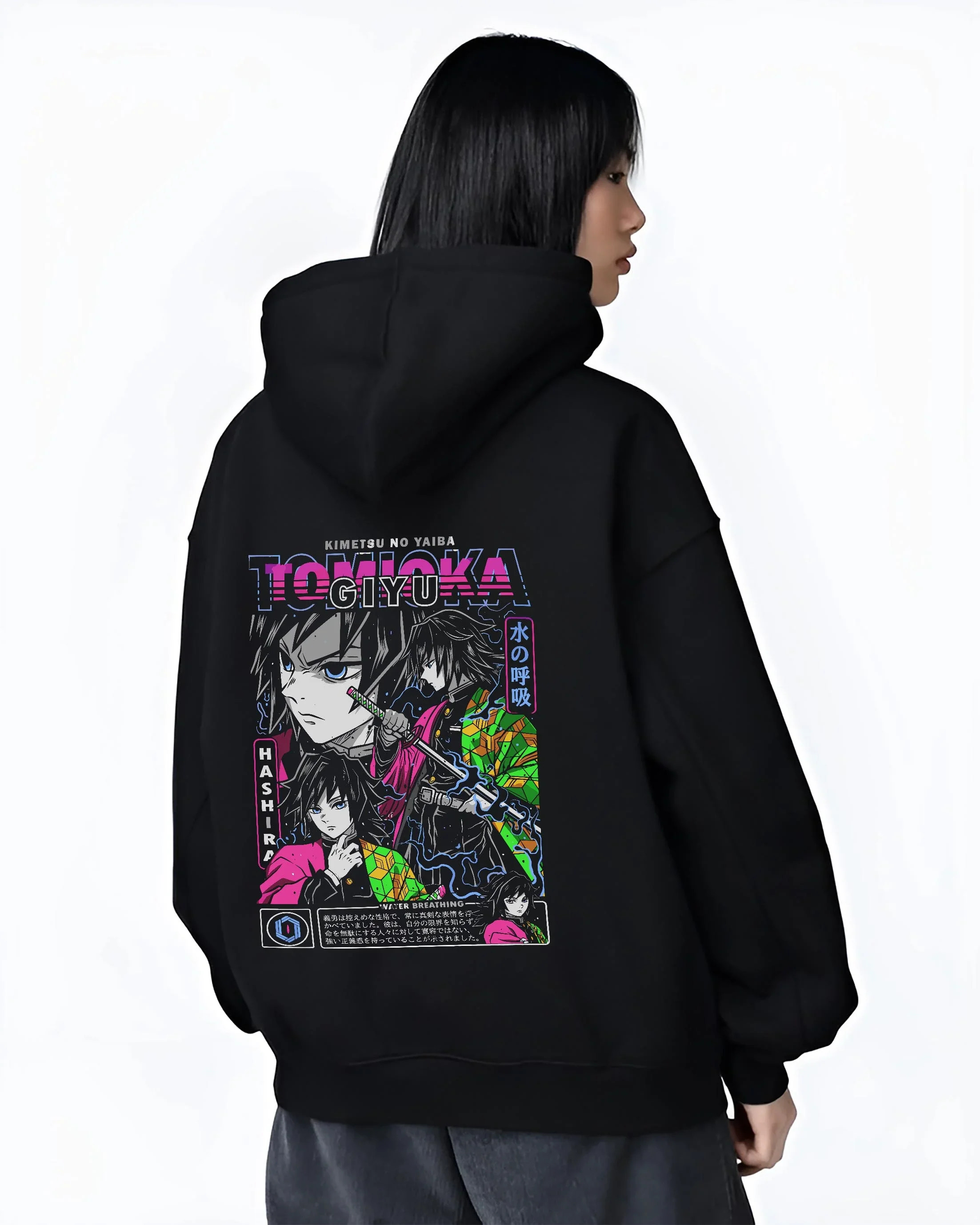 Black hoodie worn by female model, back view with Demon Slayer Hoodie Giyu Tomioka Hashira Guard Jumper graphic bold anime graphic.
