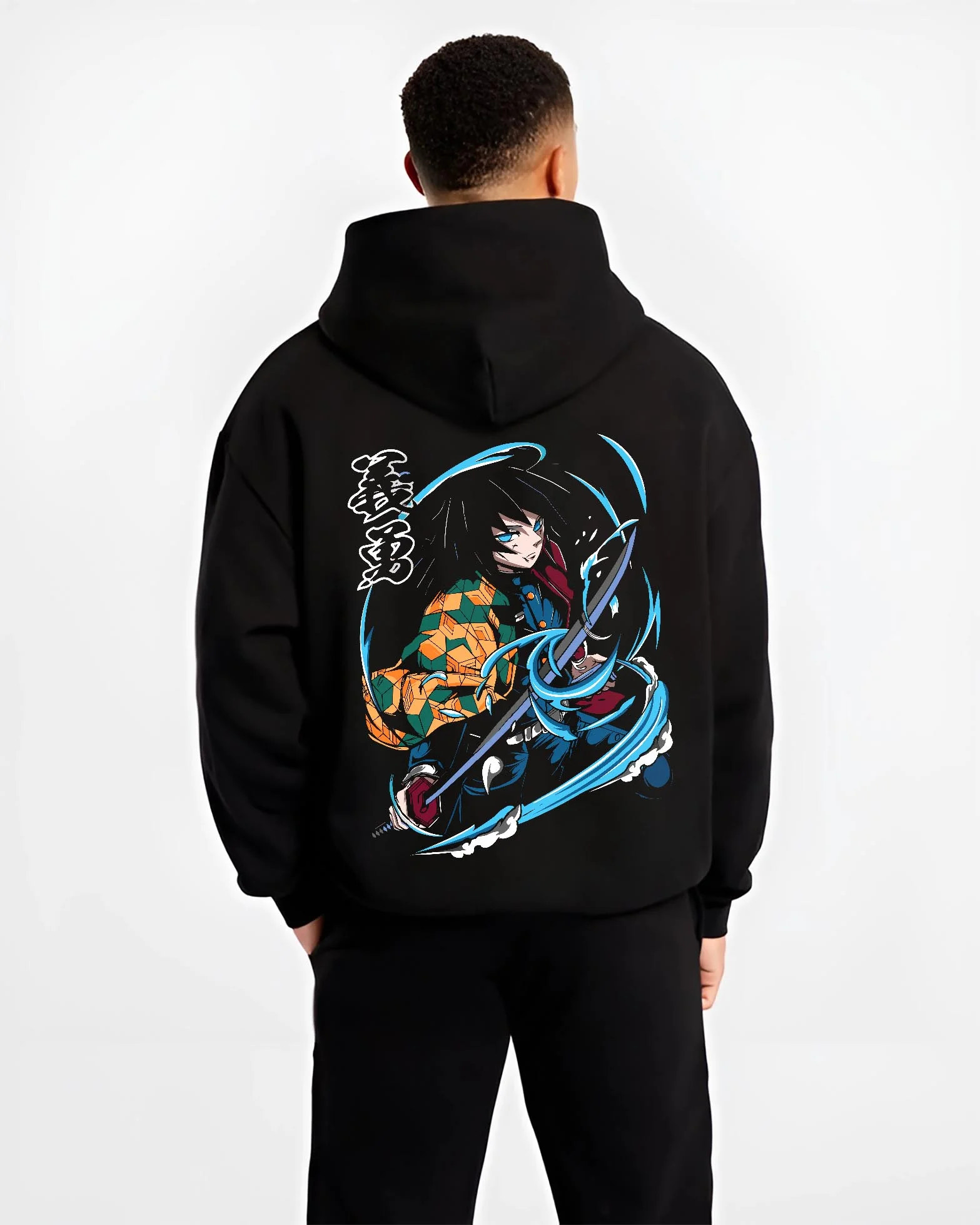 Black hoodie worn by male model, back view with Demon Slayer Hoodie Giyu Tomioka Sword Slash Jumper graphic streetwear graphic.