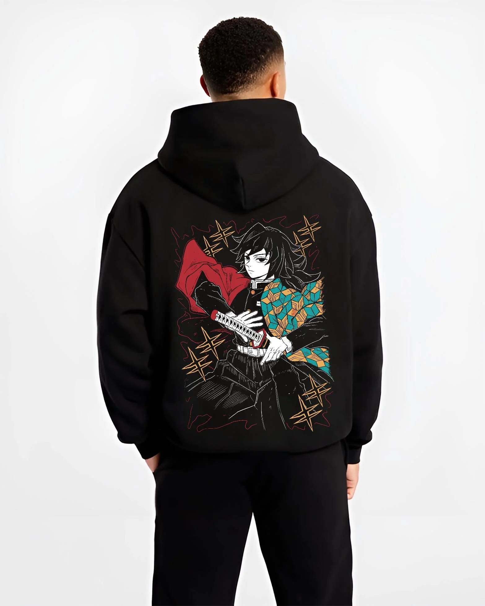 Black hoodie worn by male model, back view with Demon Slayer Hoodie Giyu Tomioka Swift Strike Jumper graphic premium wear.