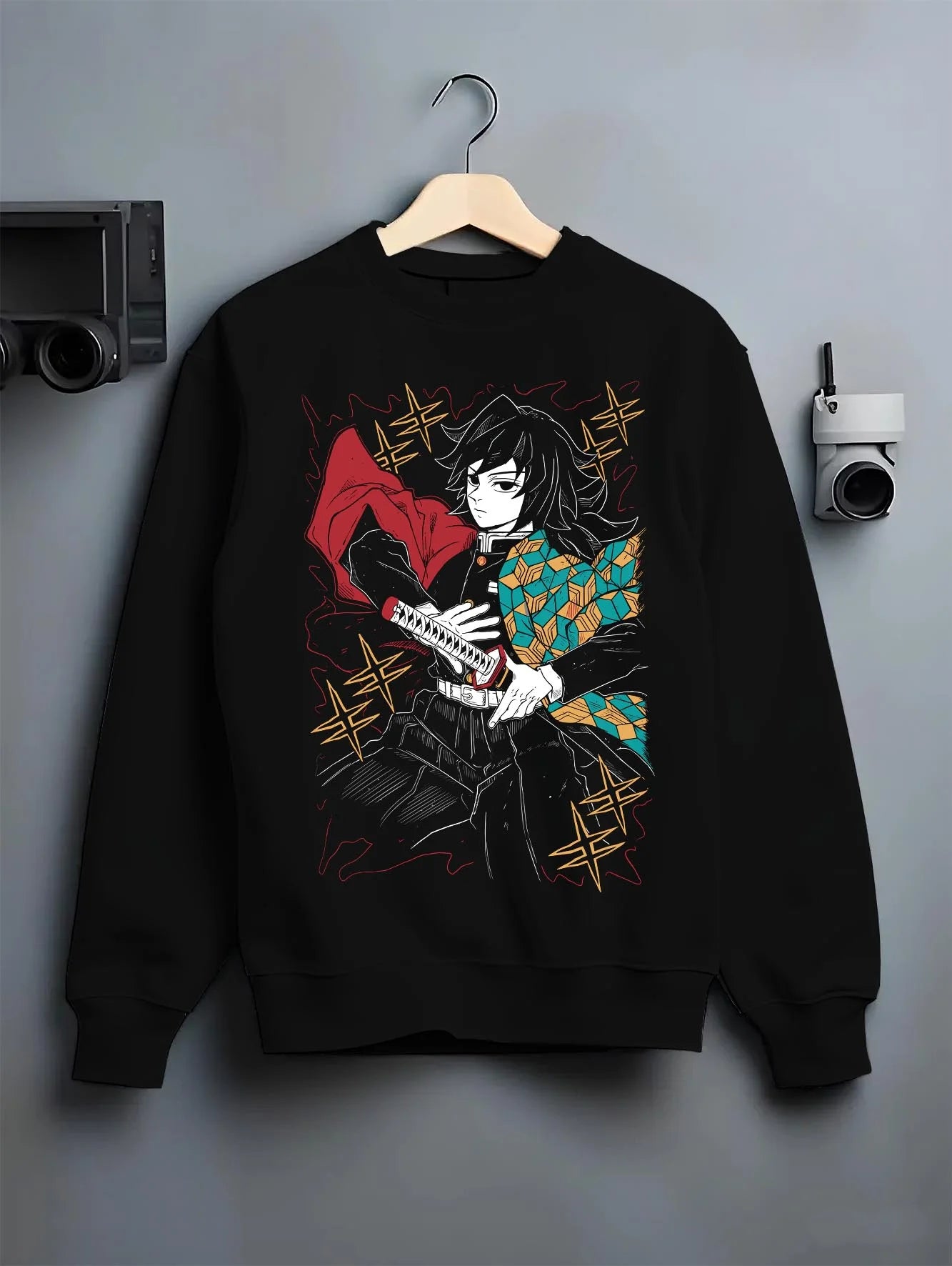 Black crewneck sweatshirt on hanger with Demon Slayer Hoodie Giyu Tomioka Swift Strike Jumper graphic premium wear.