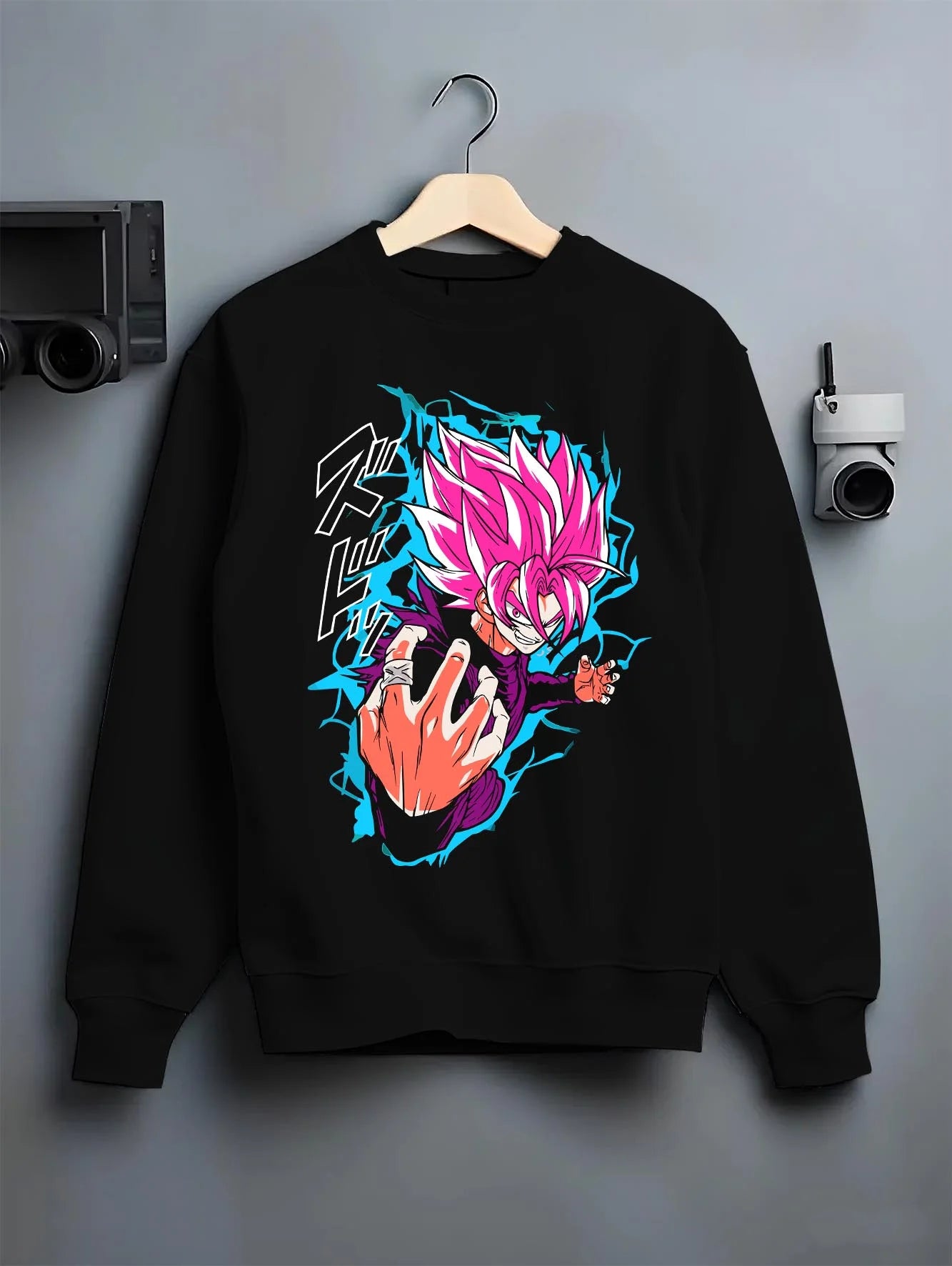 Black crewneck sweatshirt on hanger with Goku Hoodie Dragon Ball Z Super Saiyan Rose Aura graphic streetwear graphic.