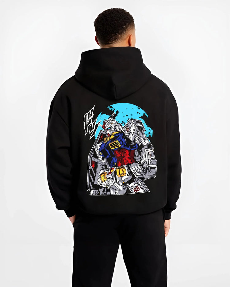 Black hoodie worn by male model, back view with Gundam Hoodie RX-78 Battle Suit Heroic Jumper graphic premium wear.