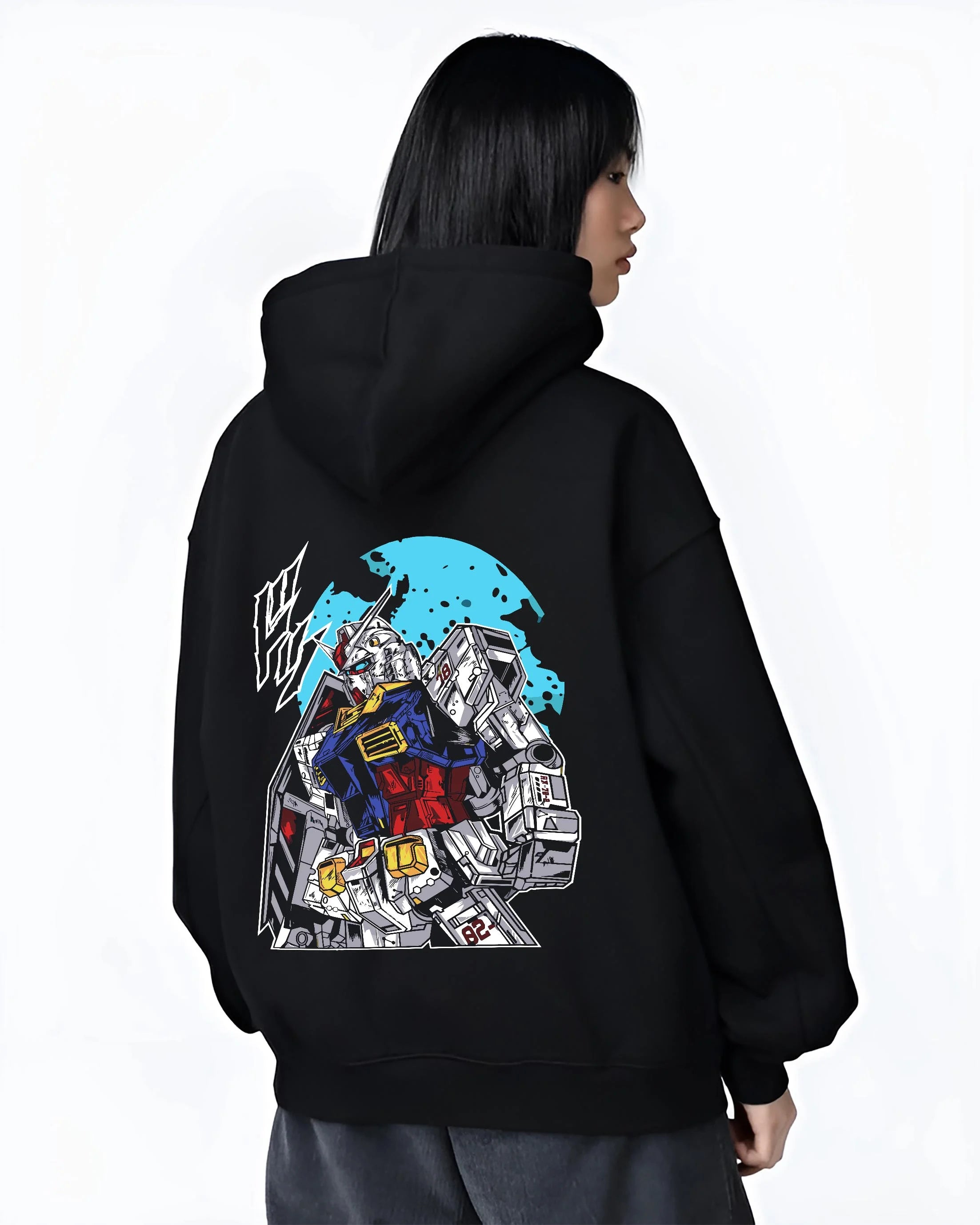 Black hoodie worn by female model, back view with Gundam Hoodie RX-78 Battle Suit Heroic Jumper graphic premium wear.