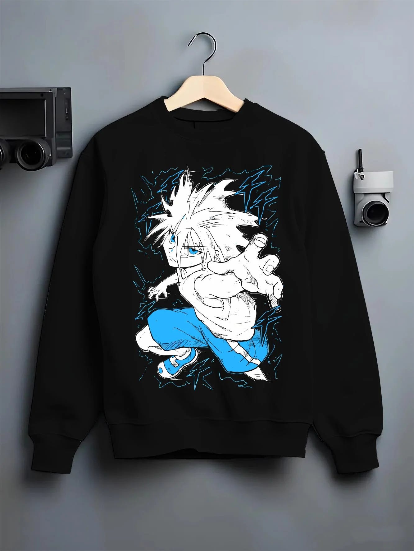 
Black crewneck sweatshirt on hanger with Hunter x Hunter Hoodie Killua Zoldyck Godspeed Jumper graphic premium wear.