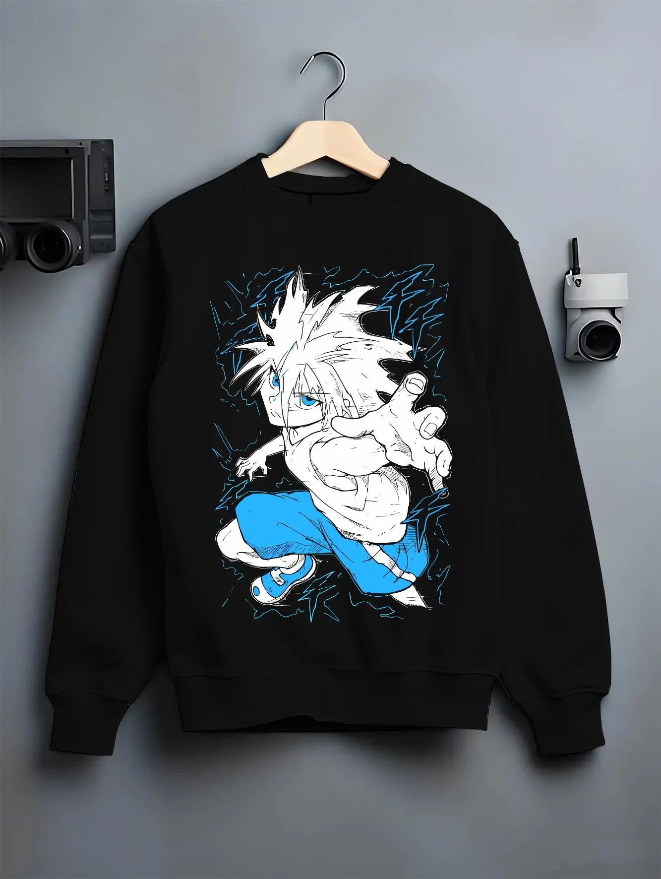 
Black crewneck sweatshirt on hanger with Hunter x Hunter Hoodie Killua Zoldyck Godspeed Jumper graphic premium wear.