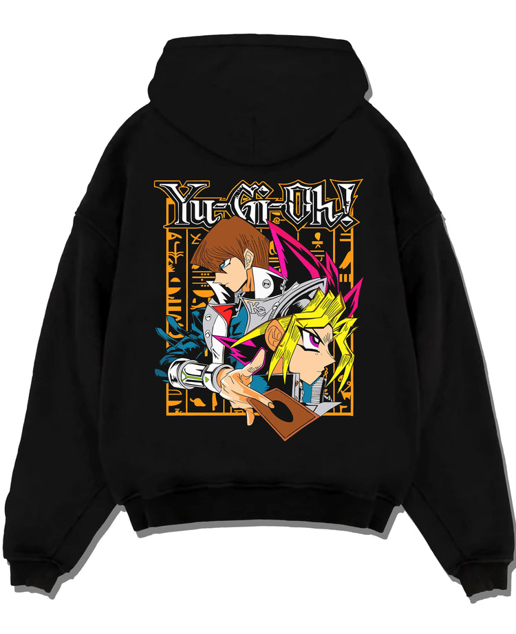 Black hoodie laid flat featuring Yu-Gi-Oh God Cards trio artwork.