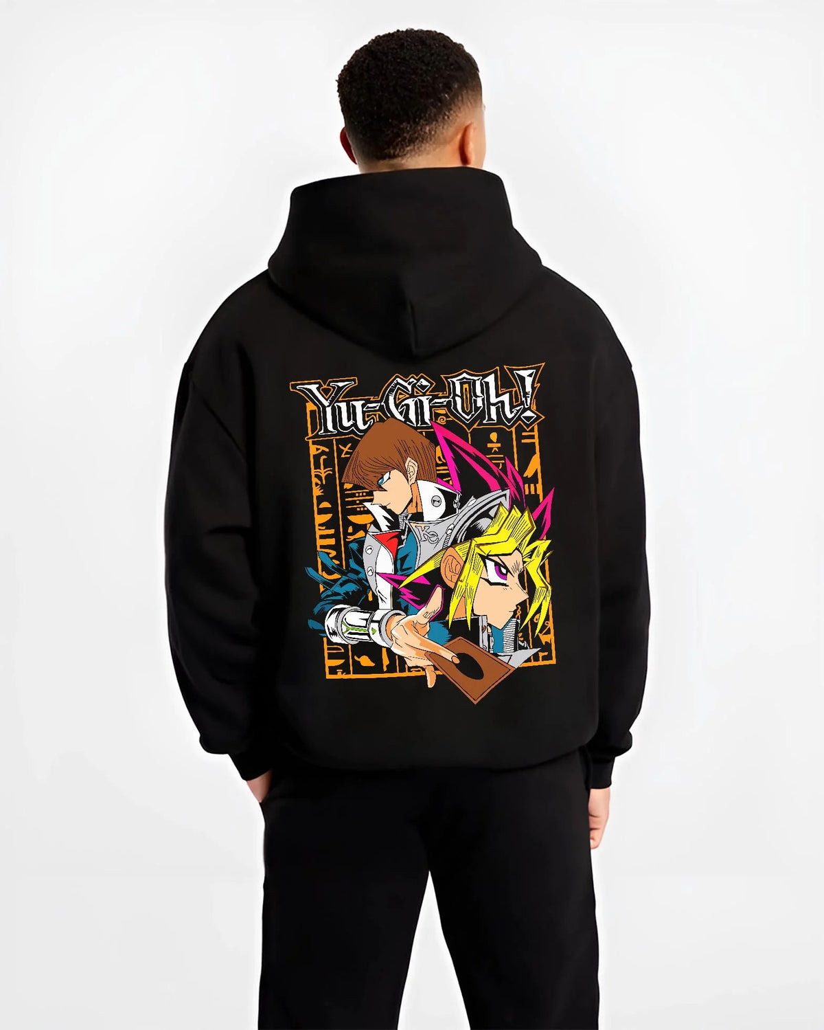 Black hoodie worn by male model from the back featuring Yu-Gi-Oh God Cards trio artwork.