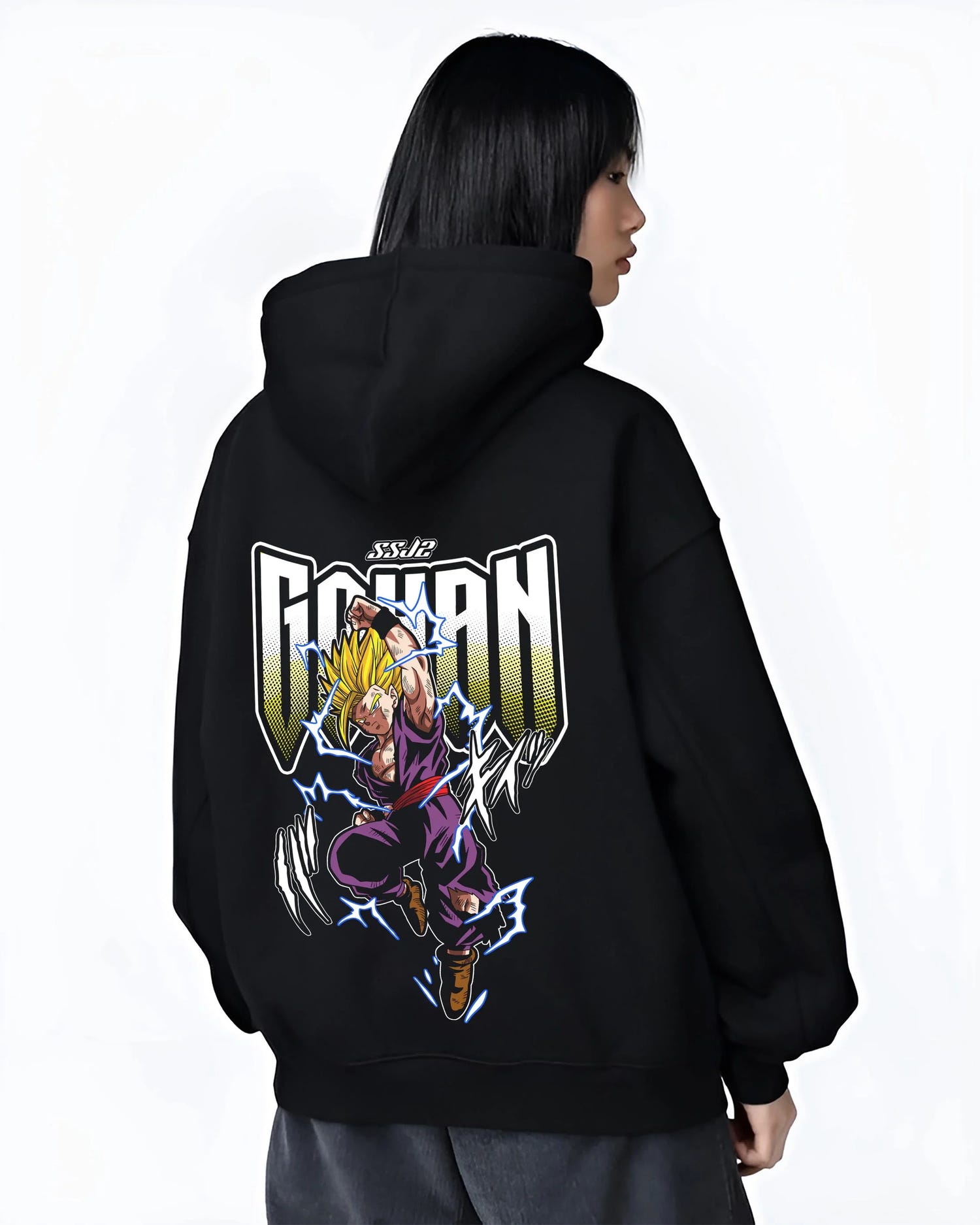 Black hoodie worn by female model, back view with Dragon Ball Z Hoodie Gohan Super Saiyan Power Jumper graphic streetwear graphic.