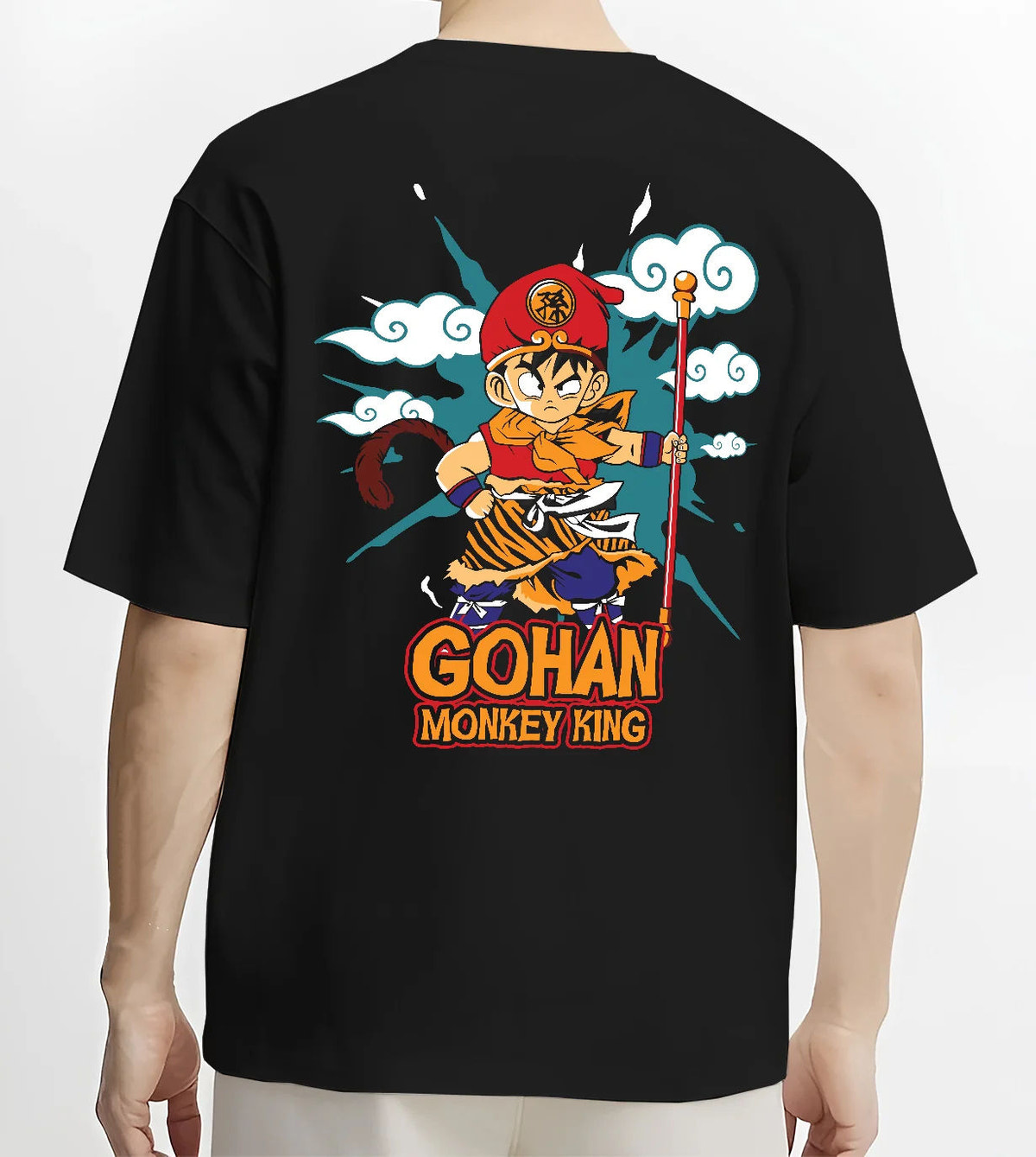 Black T-shirt model back view showing Young Gohan from Dragon Ball: Monkey King staff parody
