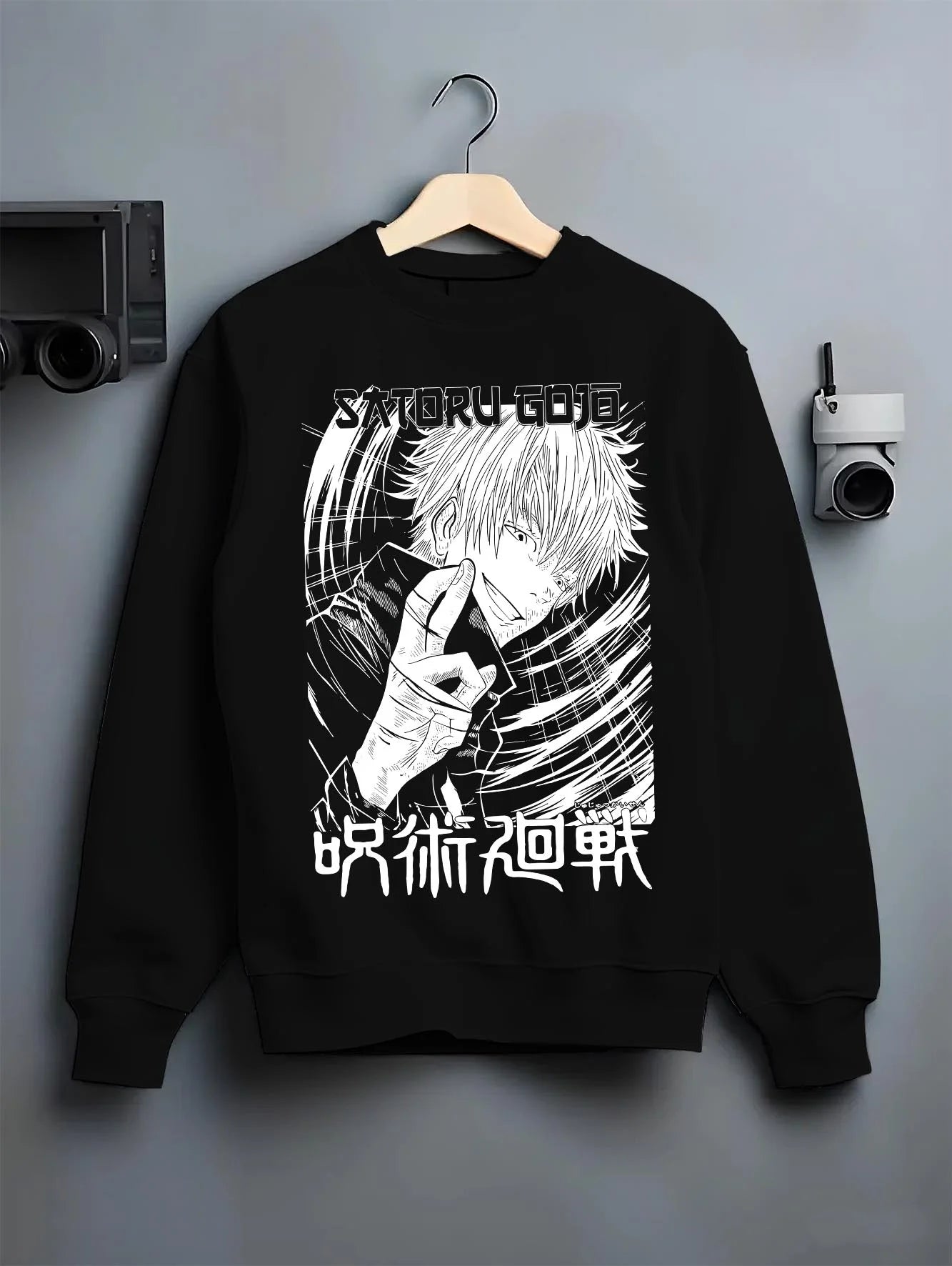 Black crewneck sweatshirt on hanger with Jujutsu Kaisen Hoodie Satoru Gojo Cool Pose Jumper graphic premium wear.