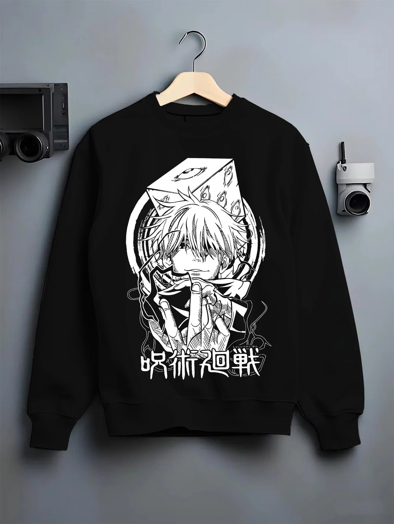 Black crewneck sweatshirt on hanger with Jujutsu Kaisen Hoodie Satoru Gojo Valiant Stance Jumper graphic streetwear graphic.