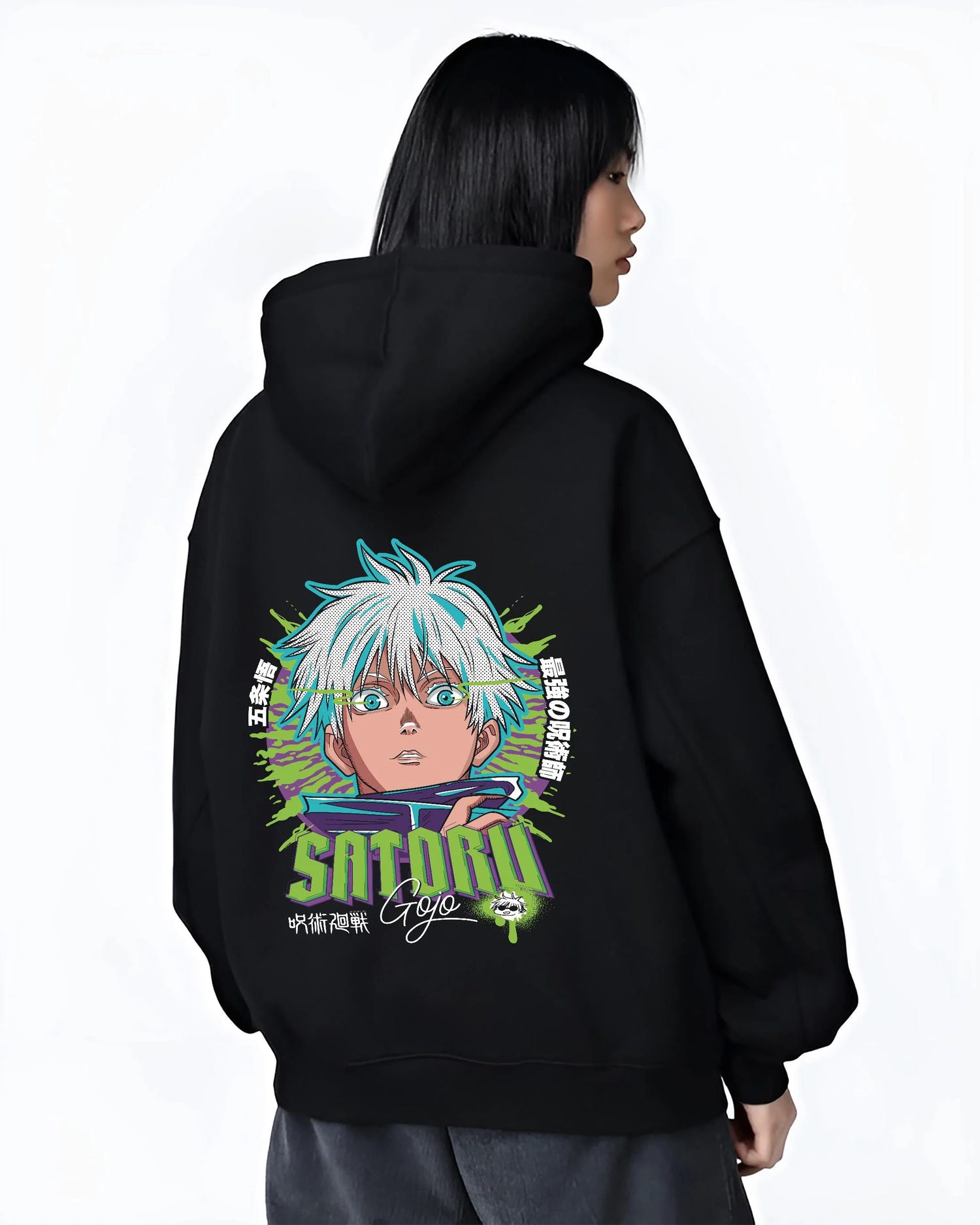 Black hoodie worn by female model, back view with Jujutsu Kaisen Hoodie Satoru Gojo Green Aura Jumper graphic bold anime graphic.
