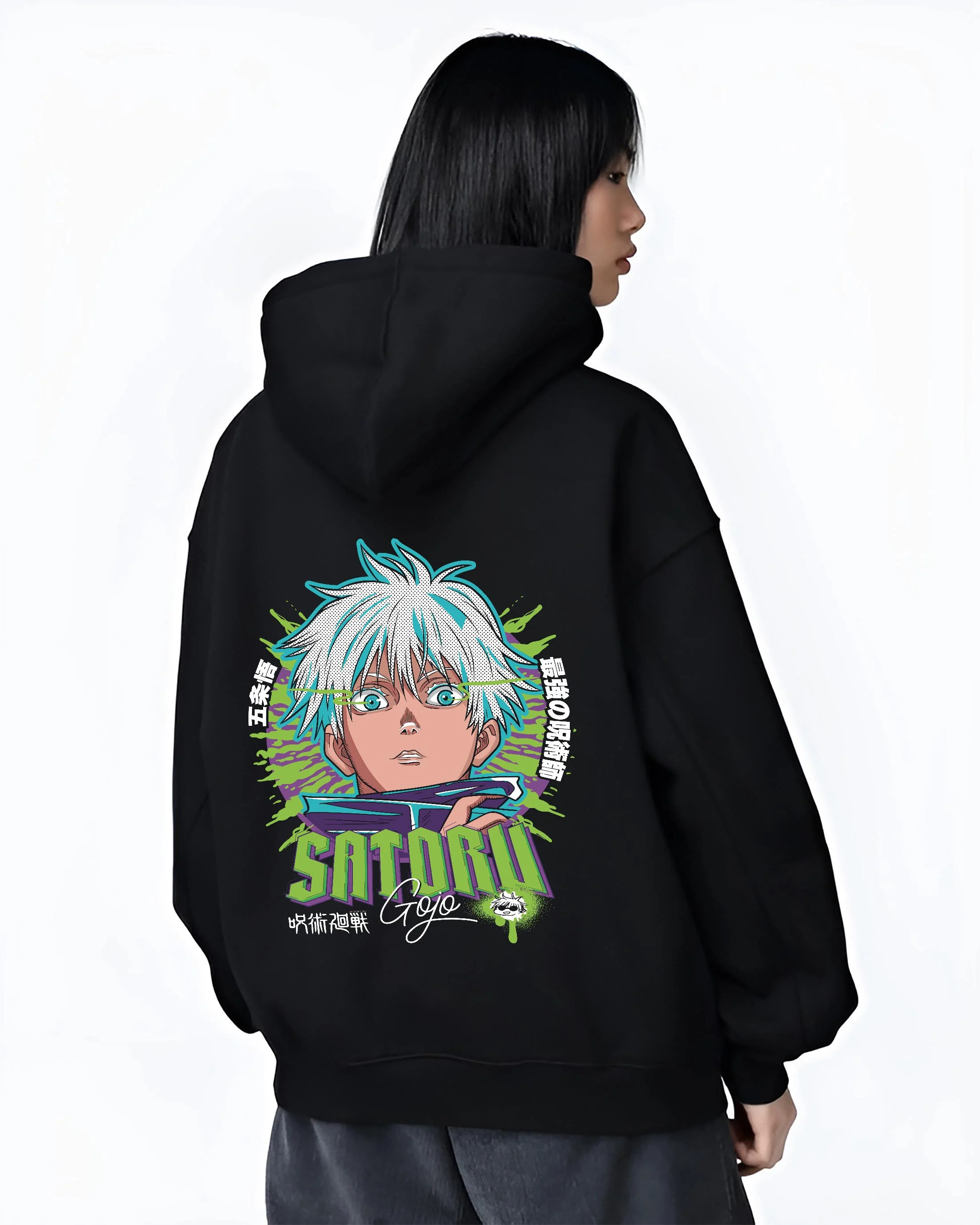 Black hoodie worn by female model, back view with Jujutsu Kaisen Hoodie Satoru Gojo Green Aura Jumper graphic bold anime graphic.