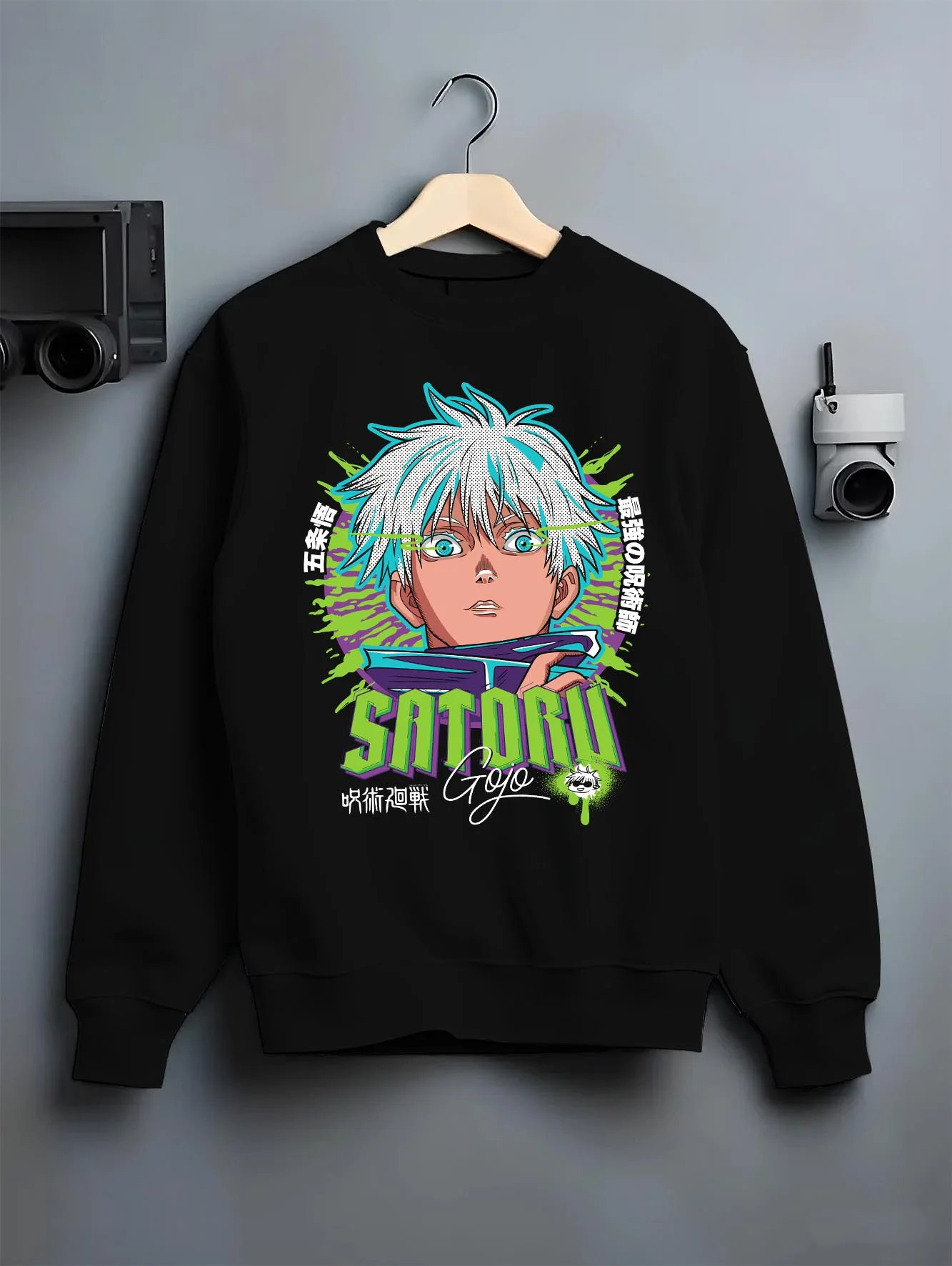 Black crewneck sweatshirt on hanger with Jujutsu Kaisen Hoodie Satoru Gojo Green Aura Jumper graphic streetwear graphic.
