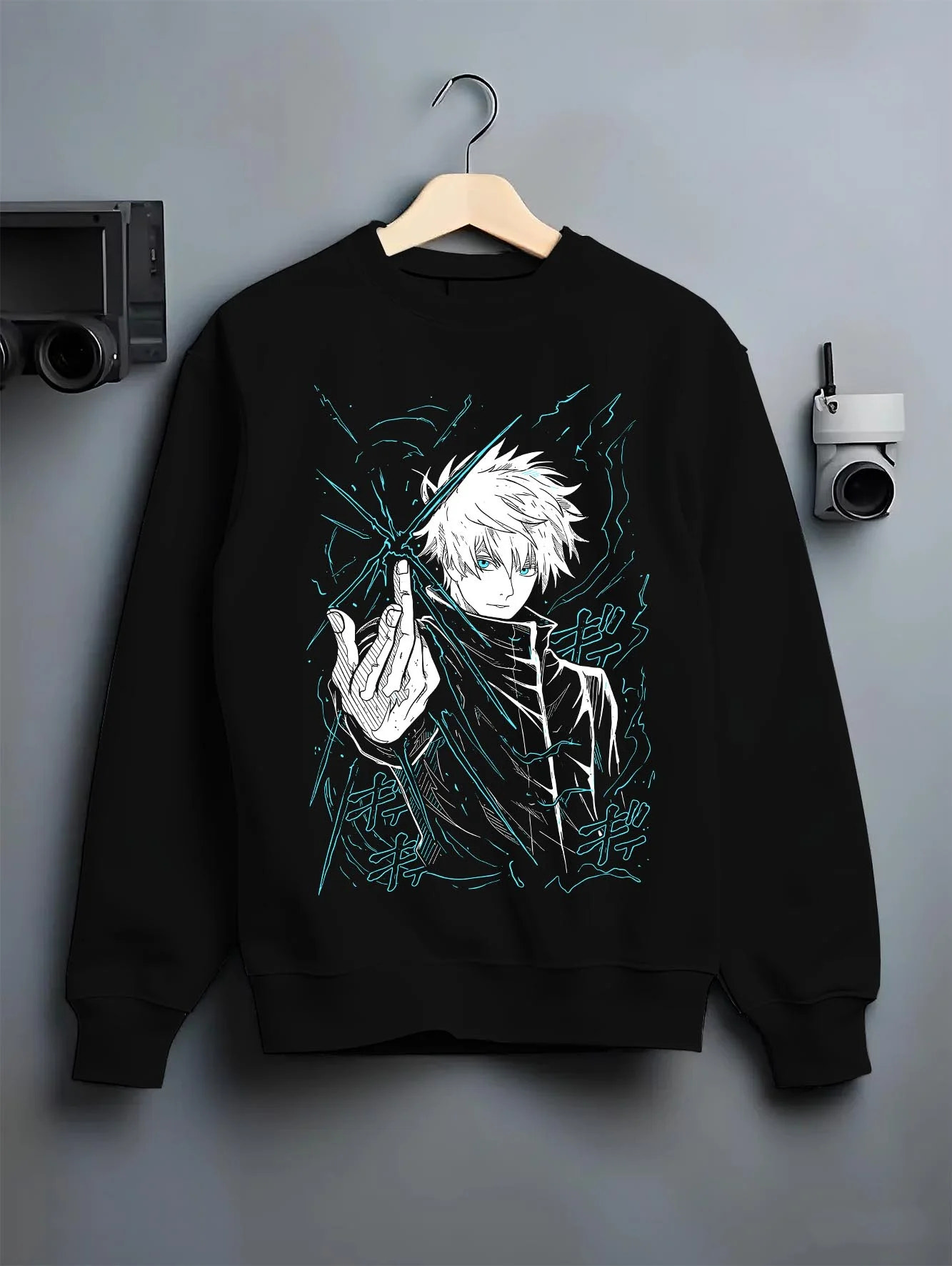 Black crewneck sweatshirt on hanger with Jujutsu Kaisen Hoodie Satoru Gojo Epic Clash Jumper graphic bold anime graphic.